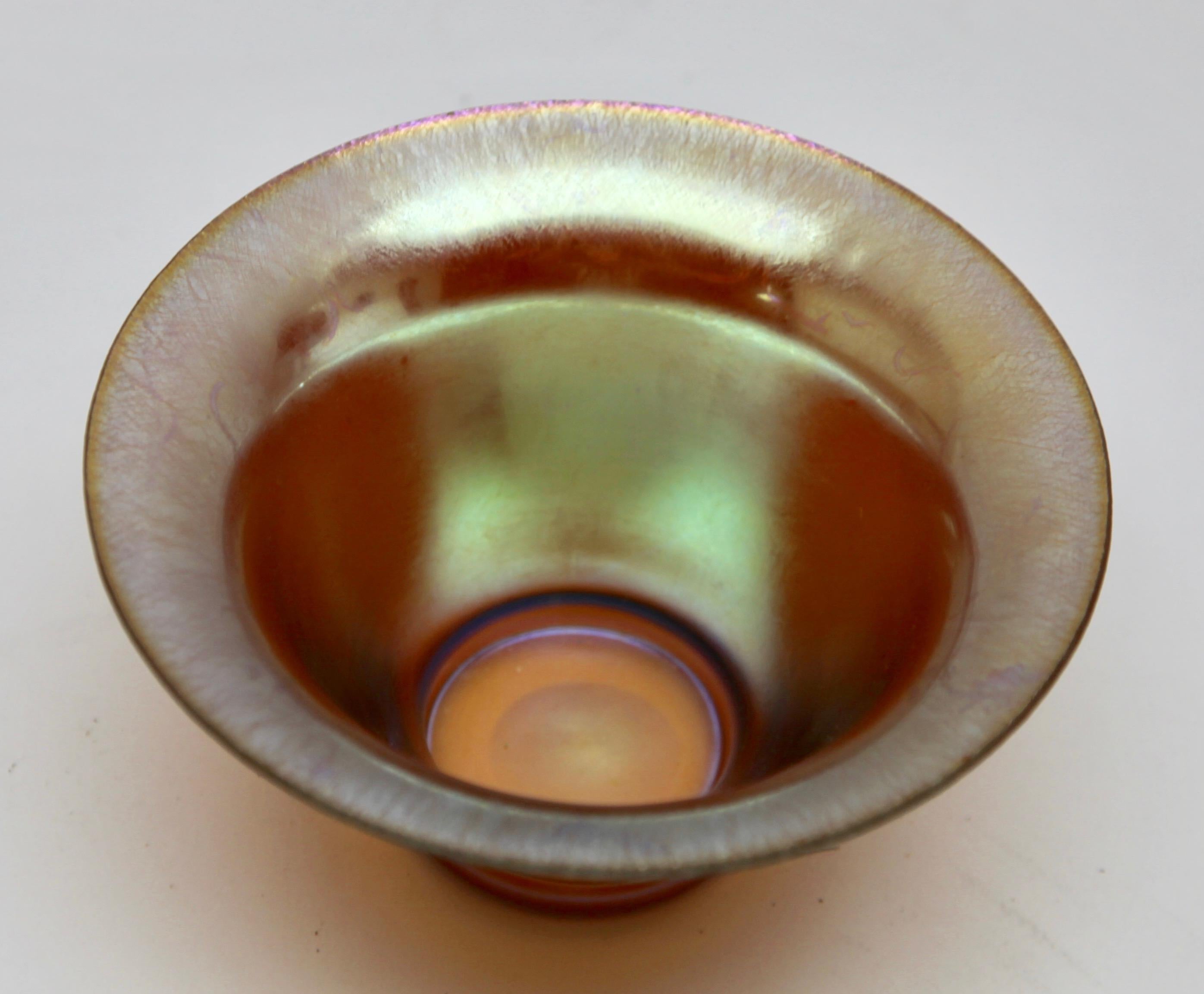 Iridescent glass bowl by WMF from the Myra range
Small WMF Myra
Measures: Diameter 13 cm, height 6 cm.





 

 

 

 












  