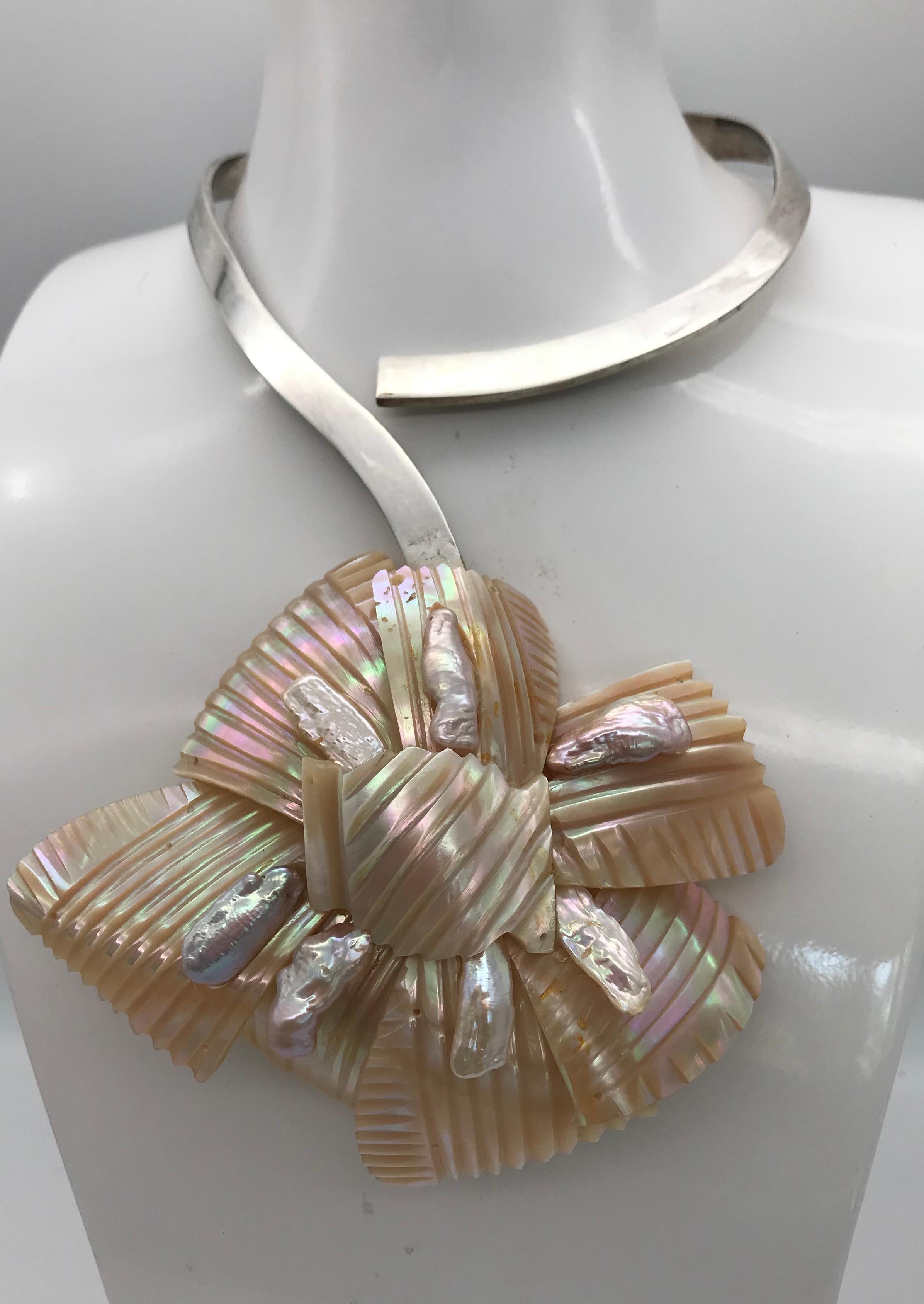 	

 Pink Nacre Turbos was a favorite shell in the Decorative Arts and Jewelry during French Deco and Victorian periods. The large Turbos are neither available in the wild nor grown in aquaculture farms. The materials Gottwald uses are antique, from