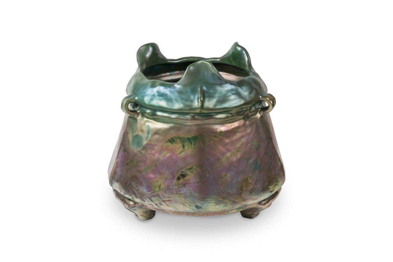 Iridescent planter, in the shape of a cauldron by Clément Massier, for the Hôtel Ritz, (signed)
Golfe Juan
1885 
Iridescent glazed earthenware

This planter designed by Clément Massier, annotated 