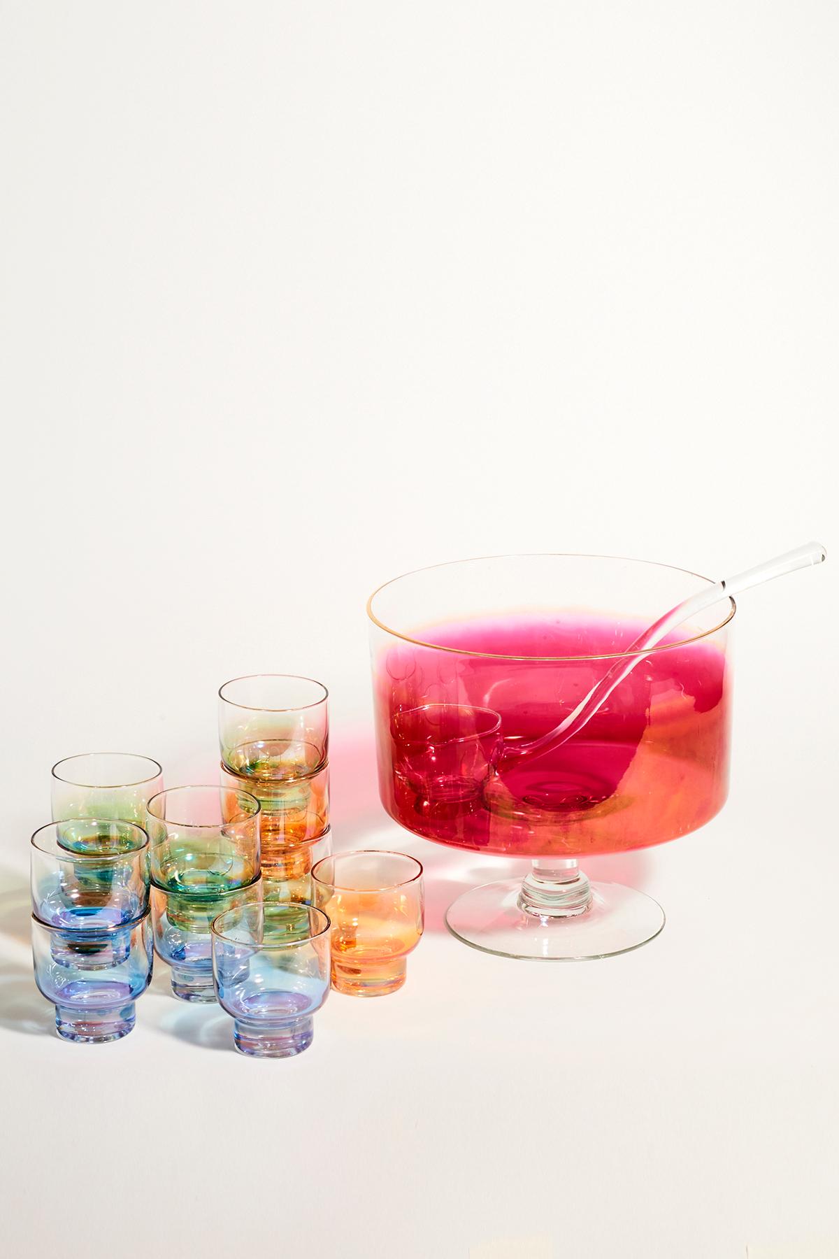 Beautiful iridescent rainbow punch bowl with the perfect set of glasses.
