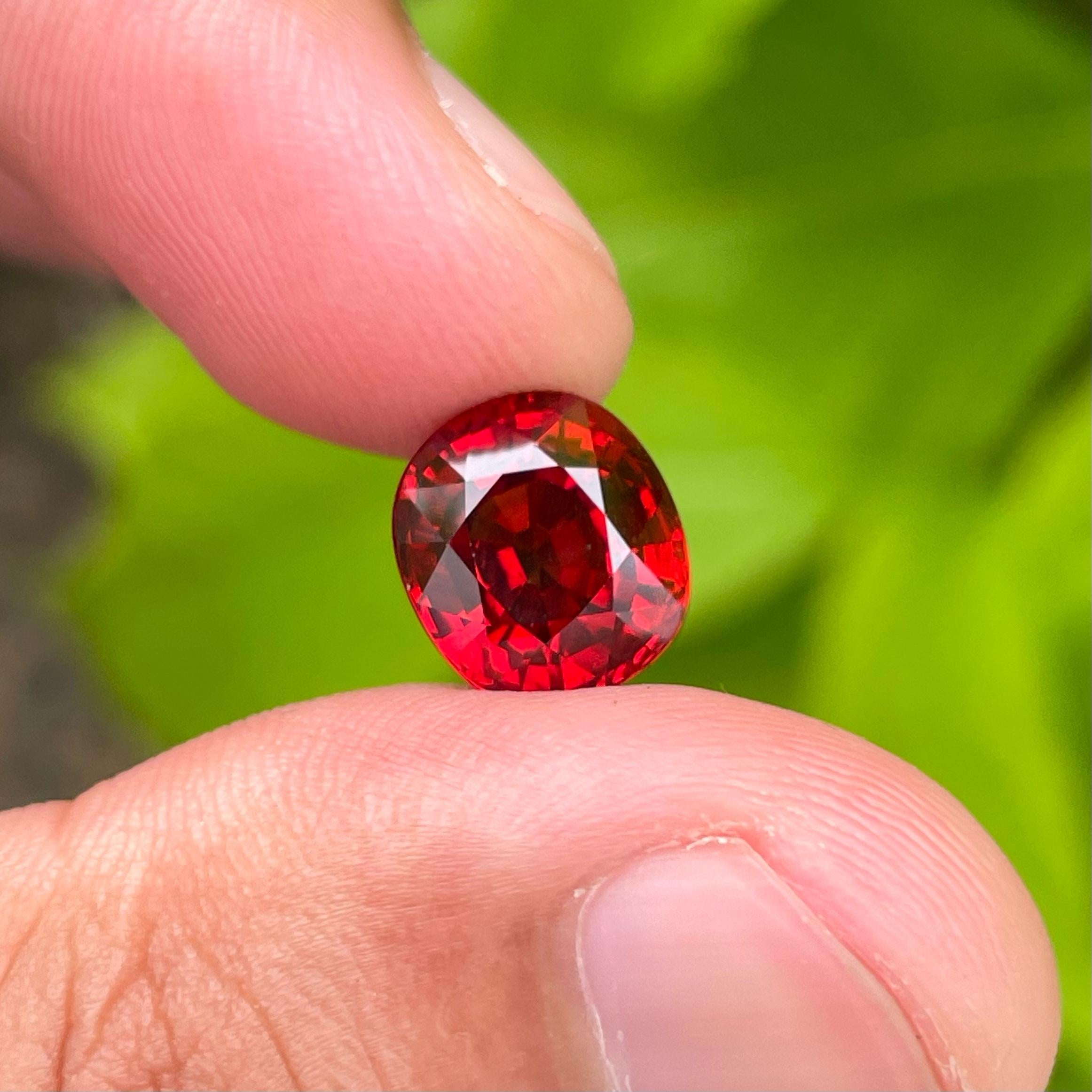 Modern Iridescent Red Spessartite Garnet 6.15 carats Fancy Oval Cut Tanzanian Gemstone