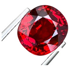 Iridescent Red Spessartite Garnet 6.15 carats Fancy Oval Cut Tanzanian Gemstone