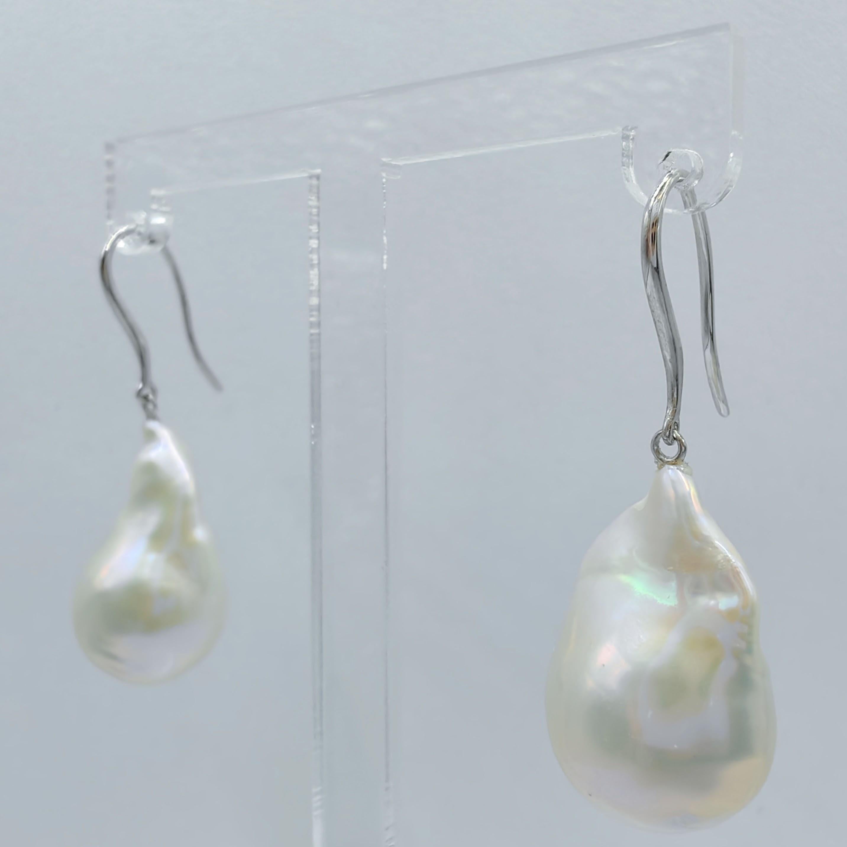 Contemporary Iridescent White Baroque Pearl Drop Earrings With 18K White Gold French Hooks For Sale