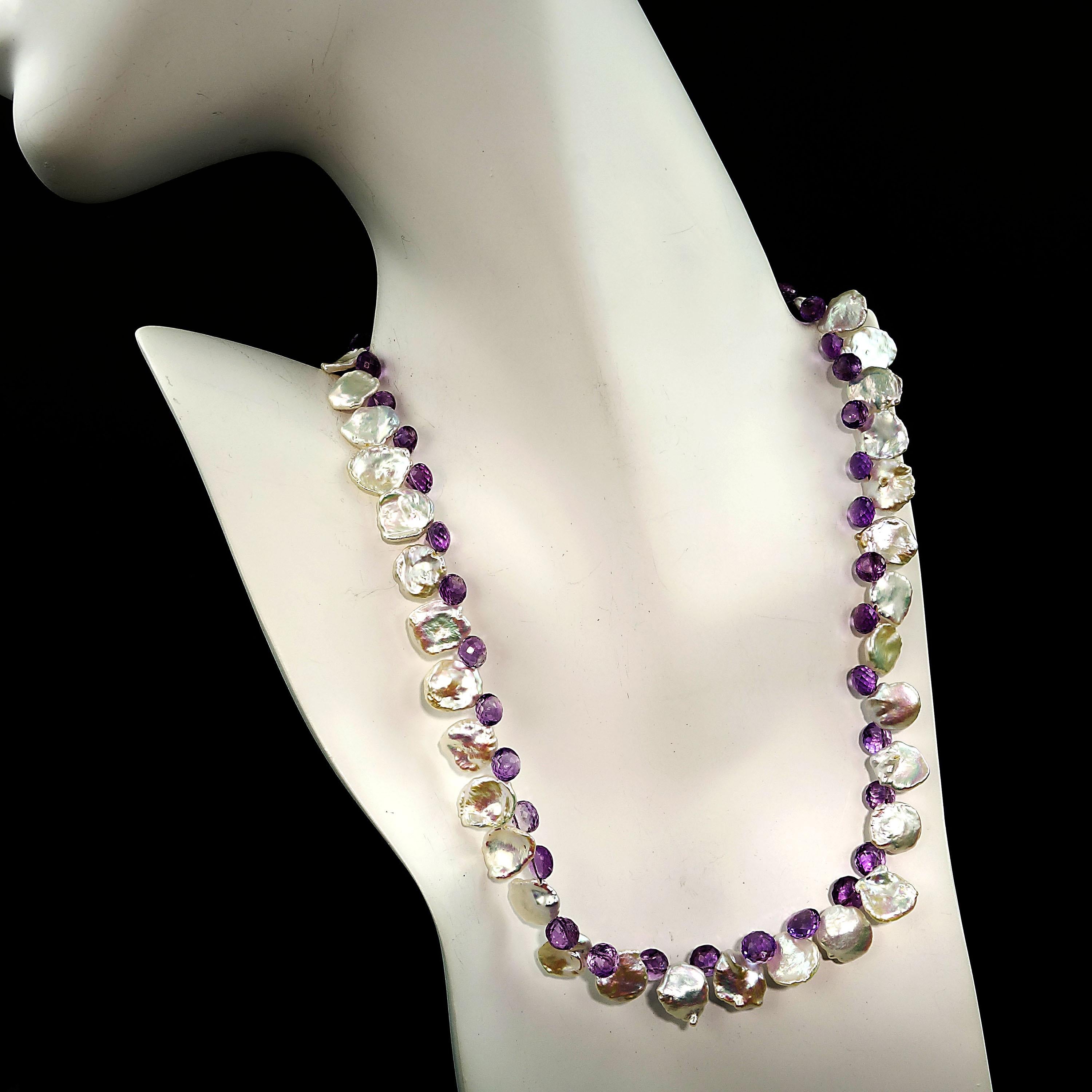 Handmade, delicate Necklace of 11mm round Iridescent Keshi Pearls and fat, faceted lavender Amethyst briolettes, 6x7mm. The Keshi Pearls reflect the lavender in the Amethyst for a lovely combination of color and texture. This custom made necklace is