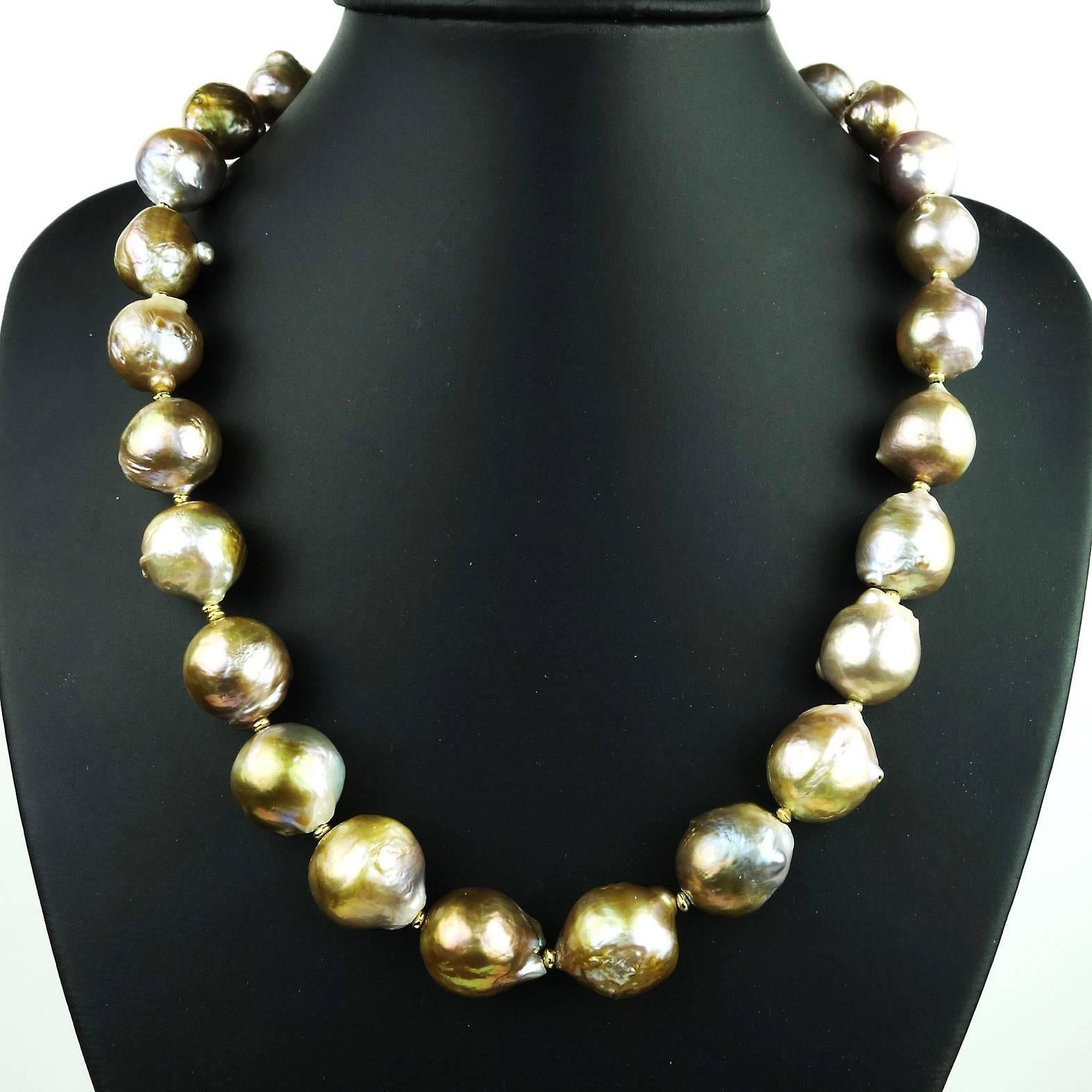 Glamorous large, 14-16MM, custom made Wrinkle Pearl necklace in iridescent shades of gold, silver, mauve, and pink. These magnificent pearls each have a unique look and feel.  They are accented with tiny gold tone spacers and secured with a gold