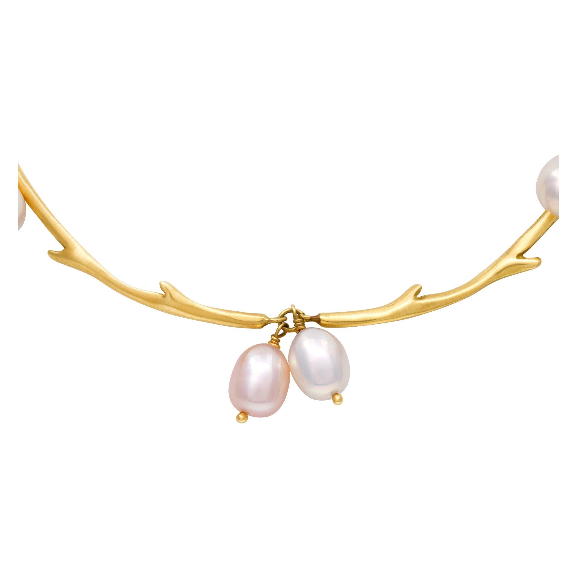 ESTIMATED RETAIL: $4,680 YOUR PRICE: $3,000 - Elegant Iridesse necklace in 18k gold with silver and pink overtone pearls. Length 14.5 inches.