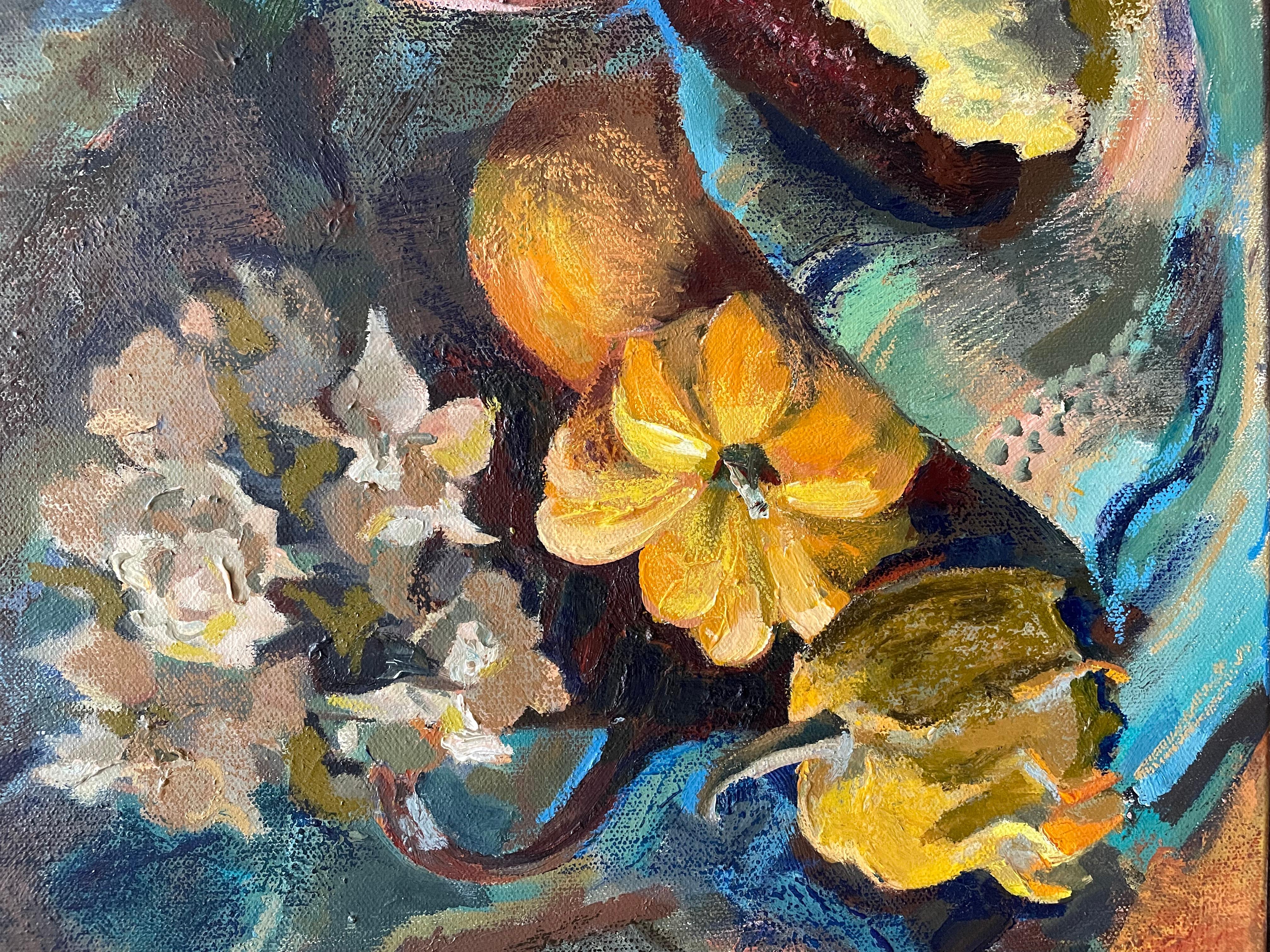 This still life mixed media painting captures a rustic autumnal composition. At its center there is a large bouquet of delicate blue flowers in a red terracotta pot, complemented by golden gourds, red decorative corn, and a bunch of dried roses. A