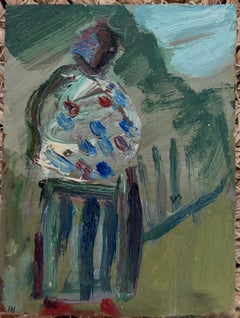 Figura con chal de lunares azules y rojos paseando por el campo