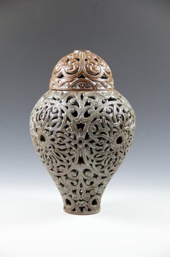 Ceramic urn - carved double wall vessel, green-olive and brown colors