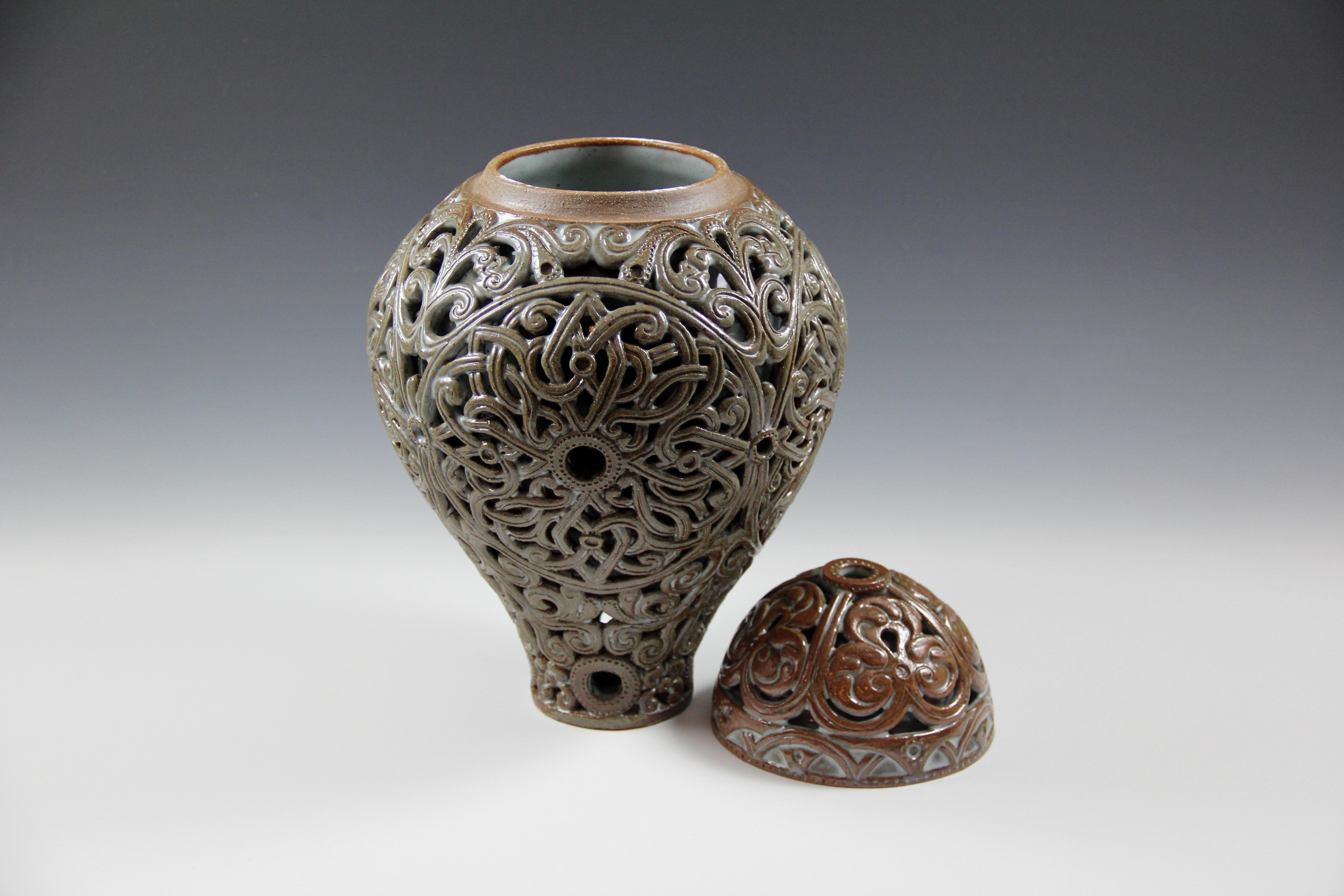 Ceramic urn - carved double wall vessel, green-olive and brown colors - Modern Sculpture by Irina Lakshin