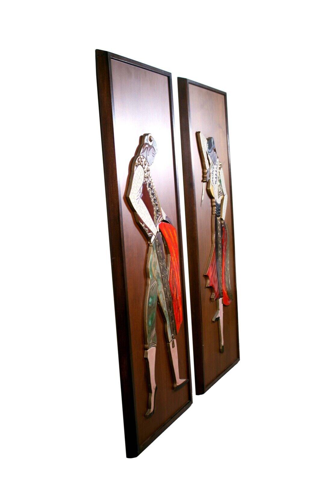 A rare and unique pair of inlaid ceramic wall hanging sculptures depicting dynamic matadors by Irina Lorin. Signed 