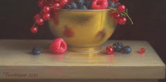 Berries in a golden bowl