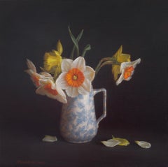Narcisi in una brocca di latte