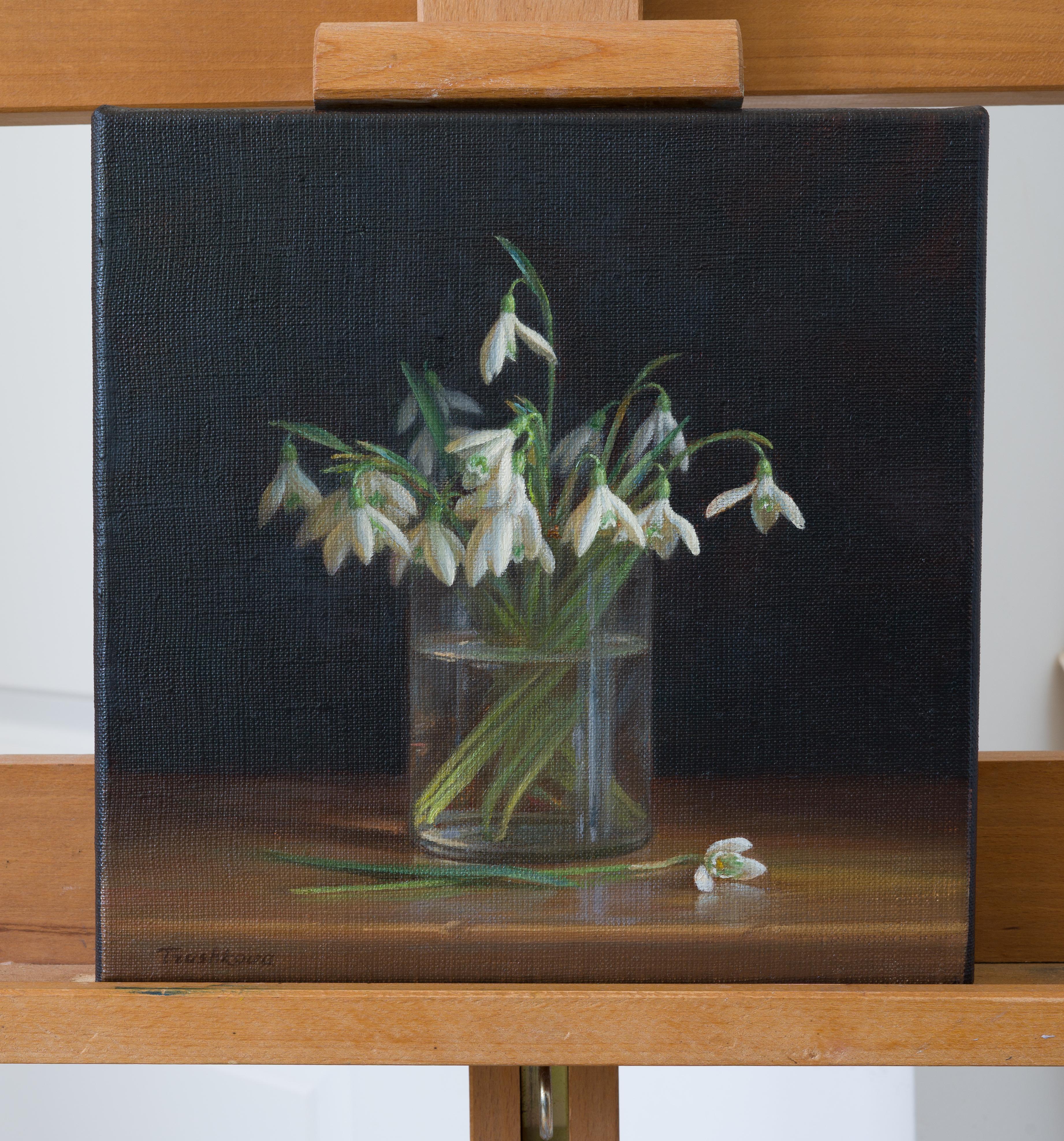 Snowdrops are the first flowers that appear in my garden. Their fragility and incredible tenderness are amazing. The various shades of white color of the flower, the reflections of the stems in the water and the transparency of the glass give the