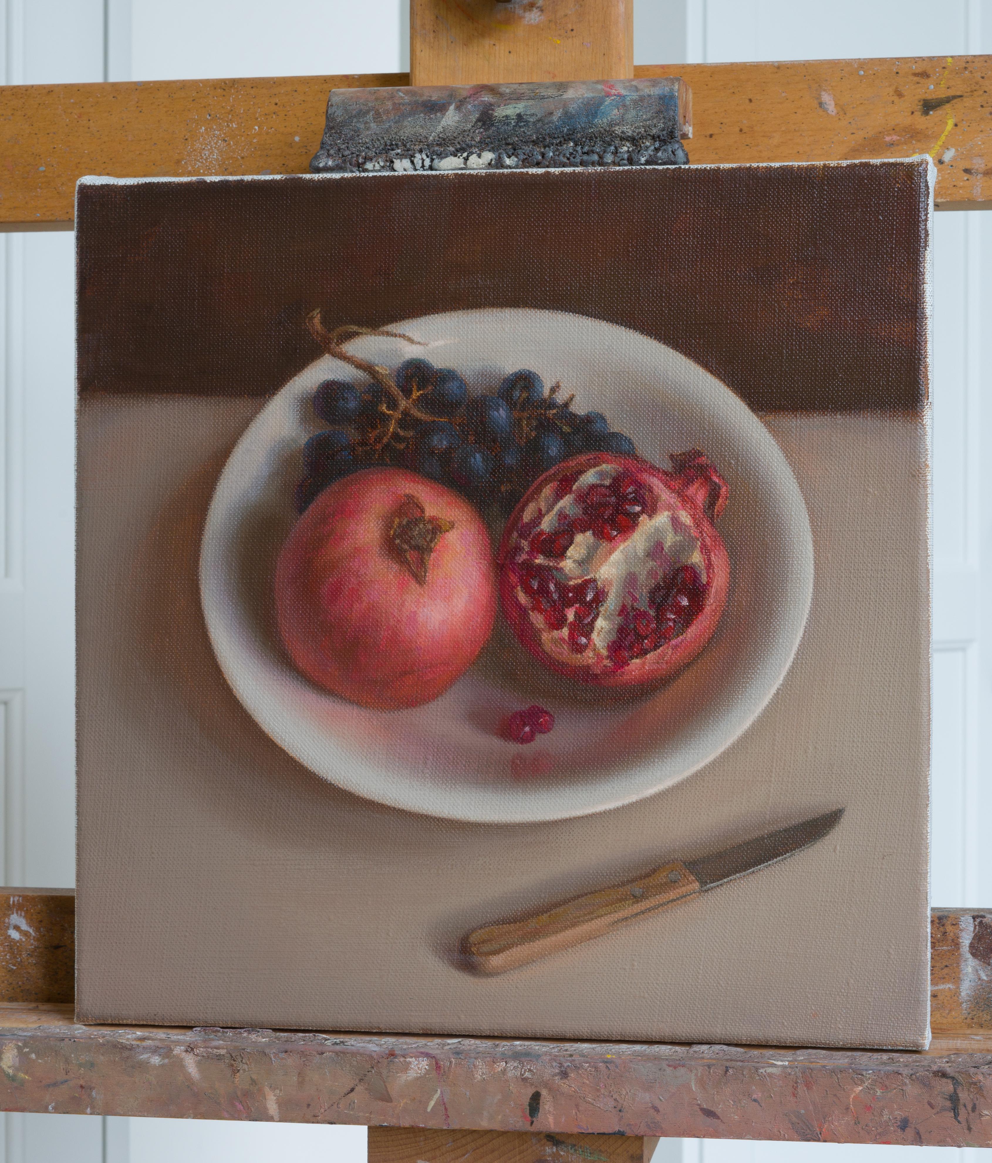 Still life with pomegranates - Realist Painting by Irina Trushkova