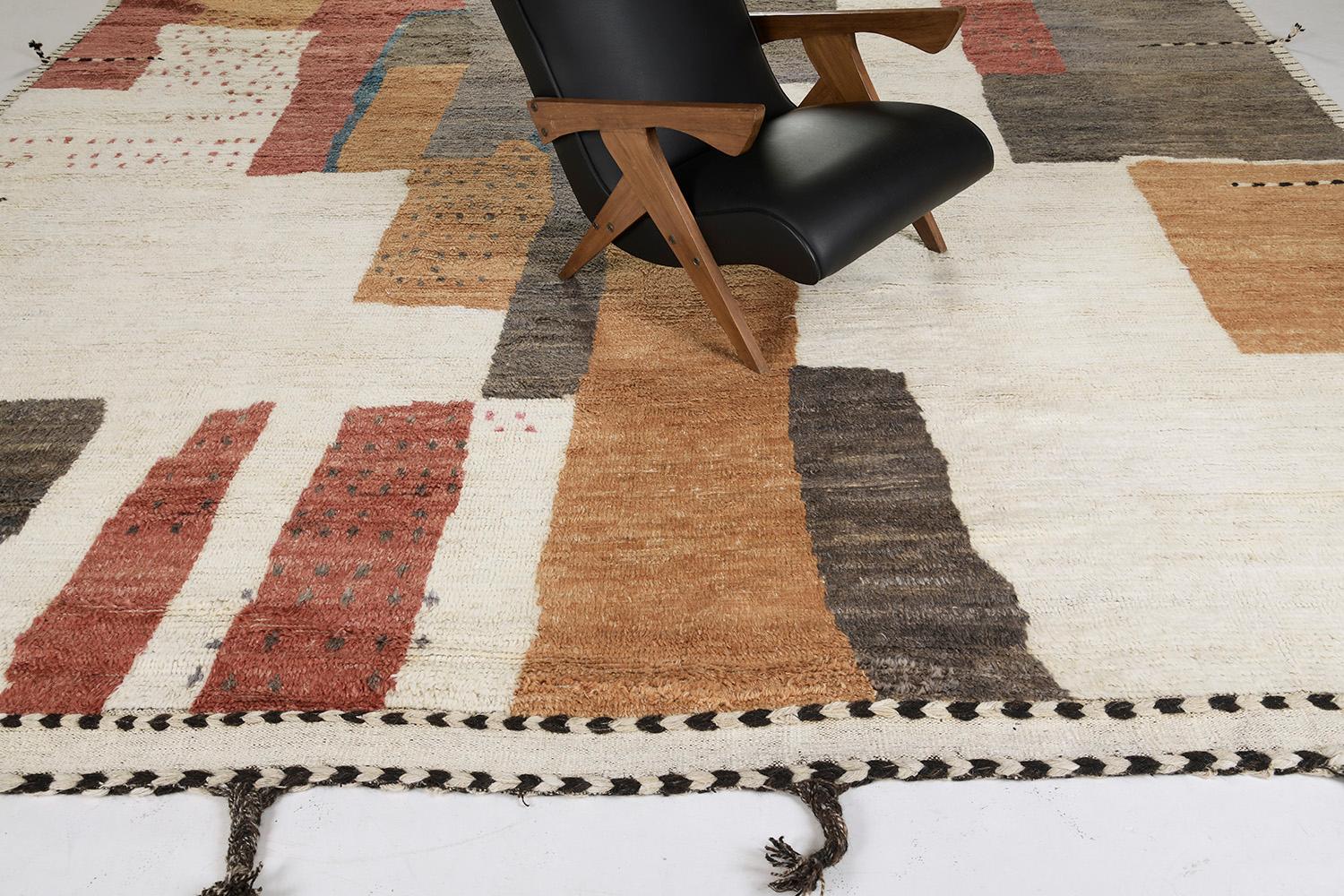Iriqui is a beautifully textured rug with irregular motifs inspired by the Atlas Mountains of Morocco. The multi-colors of red, orange, gold, and ivory work cohesively to make for a great contemporary interpretation of the modern design world.
