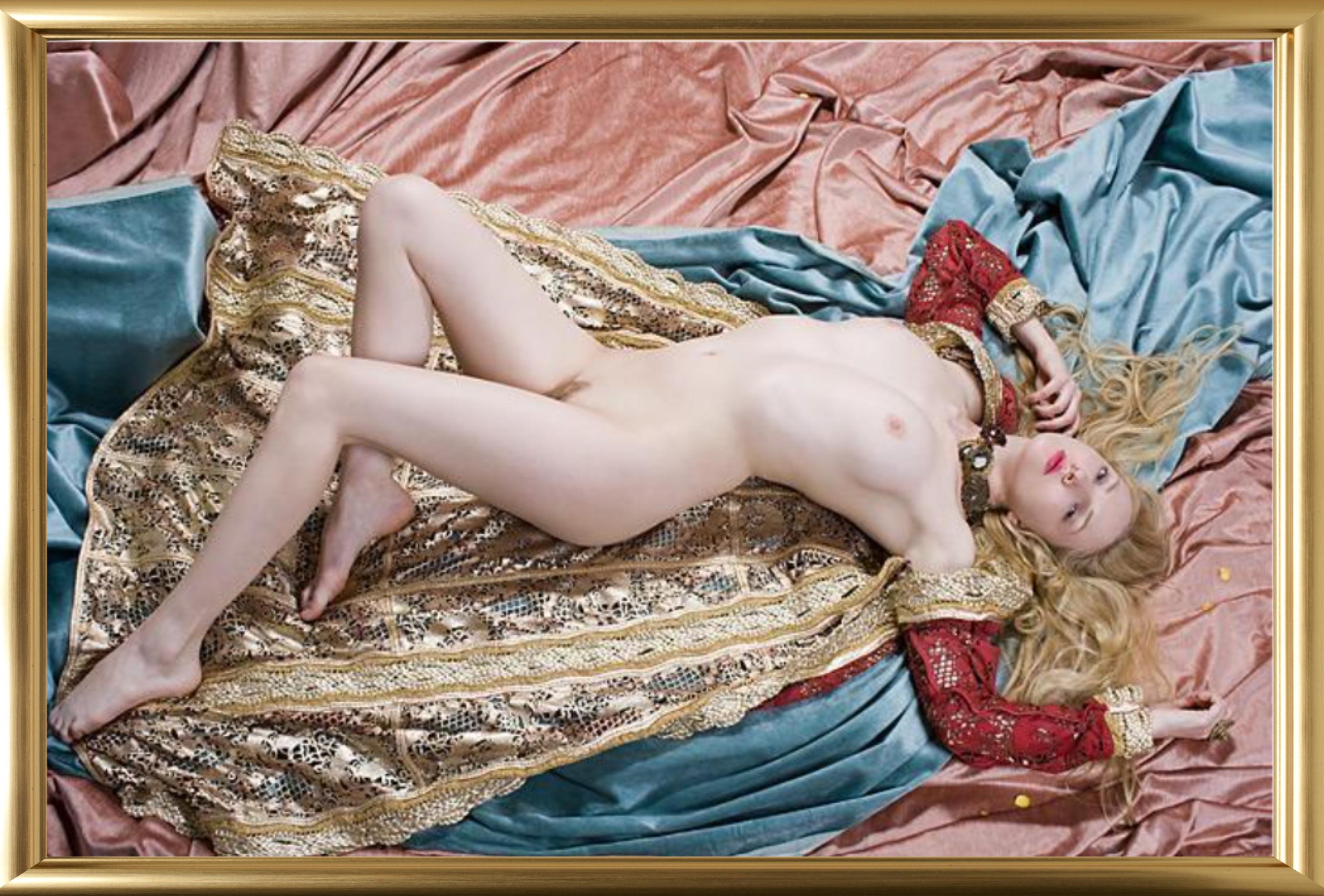 Lying Nude, NYC - nude model between fabrics, fine art photography, 2007 - Brown Color Photograph by Iris Brosch