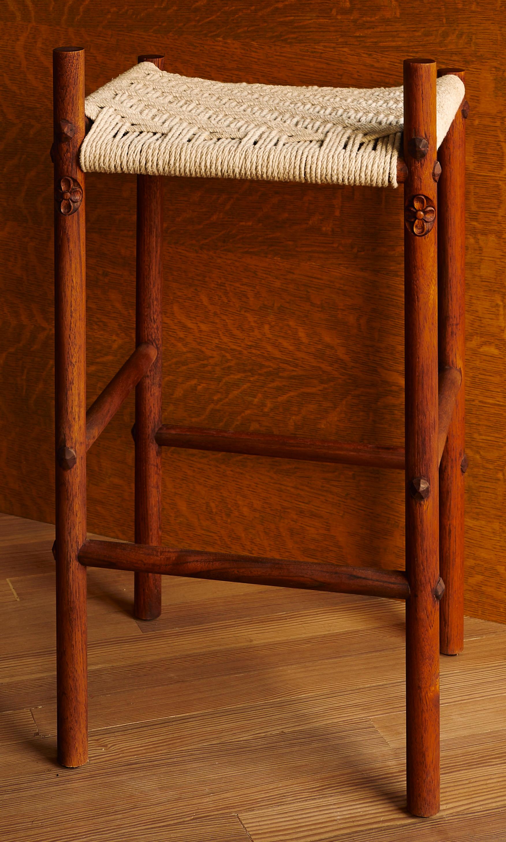 Iris Counter Stool in Oiled Teak & Woven Cotton Rope by Evam
Dimensions: D 36.8 x W 39.4 x H 73.7 cm. 
Materials: Oiled teak and cotton rope.

Available in oiled or blackened teak. Prices may vary. Please contact us.

The Iris counter stool is so