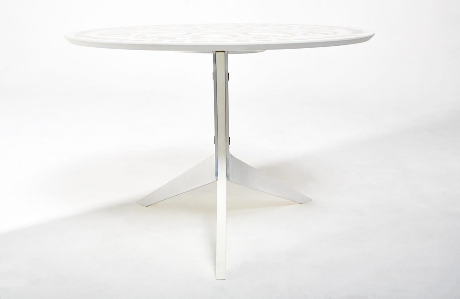 Iris end table features top in various fruitwood end-grain embedded in ABDB cloud white resin. Sculptural base consists of two stainless steel legs paired with a single cloud white resin leg.

Size: 23’’ top diameter x 17” height.

Handmade by