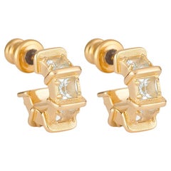 Abbracci in oro con gemme naturali di apatite blu