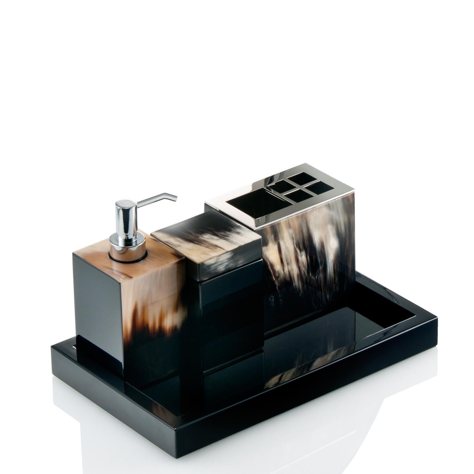 Complete your bathroom decor with this striking Iris soap dispenser. Finished in polished black lacquered wood, the design is given further character by the captivating natural shades of dark Corno Italiano inlays and by elegant details in chromed