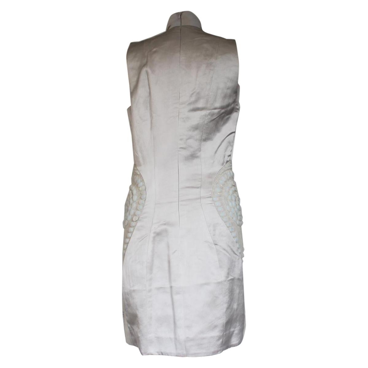 Beautiful dress by Iris van Herpen
Silk (70%) Wool (15%) Cotton (10%) Nylon
Pearl grey color
Sleeveless
Manufacture with stones on the sides
Total length cm 90 (35.4 inches)
Worldwide express shipping included in the price !