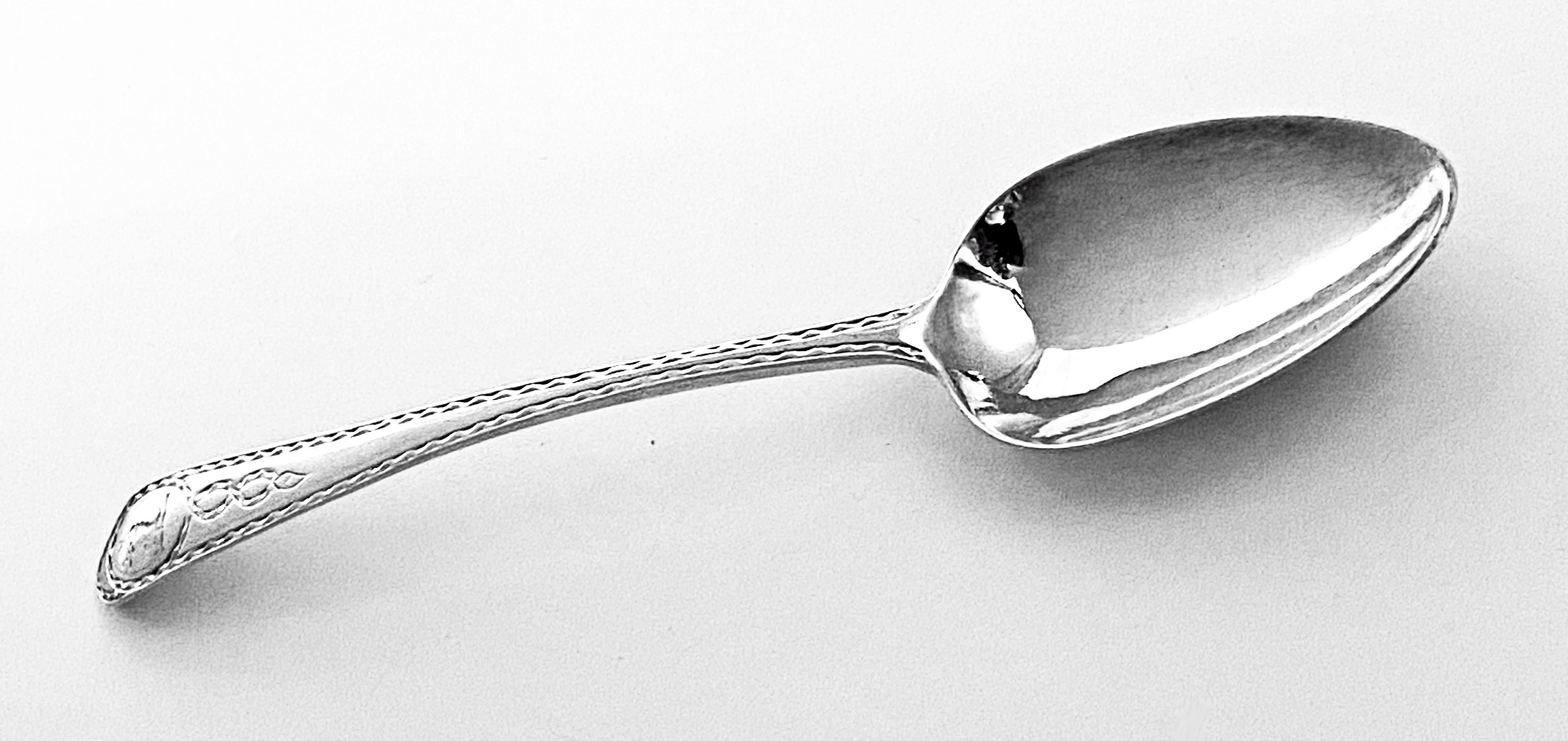 Irish Antique Silver Bright cut Celtic point Dessert Spoon Dublin C.1785 MS. Very nice crisp brightcut pattern and crest within a caduceus cartouche. Length: 6.75 inches. Marks slightly rubbed. Reflections from photography only