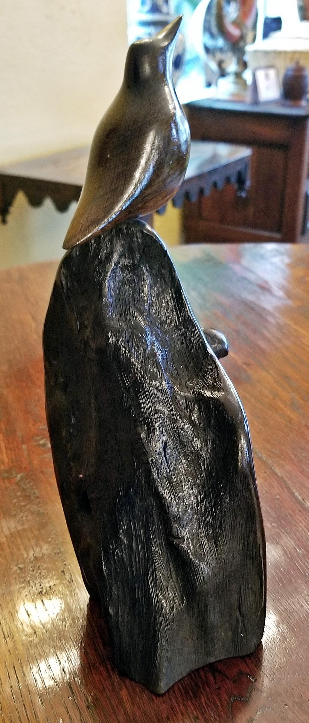 Classic piece of carved Irish Bog Oak…….Bird perching on plinth.

Made in the last 20 years…….but the Bog Oak from which it is carved, is over 5000 years old !!!!!

The center of Ireland is covered in peat bogs……..pre-historic lakes that over
