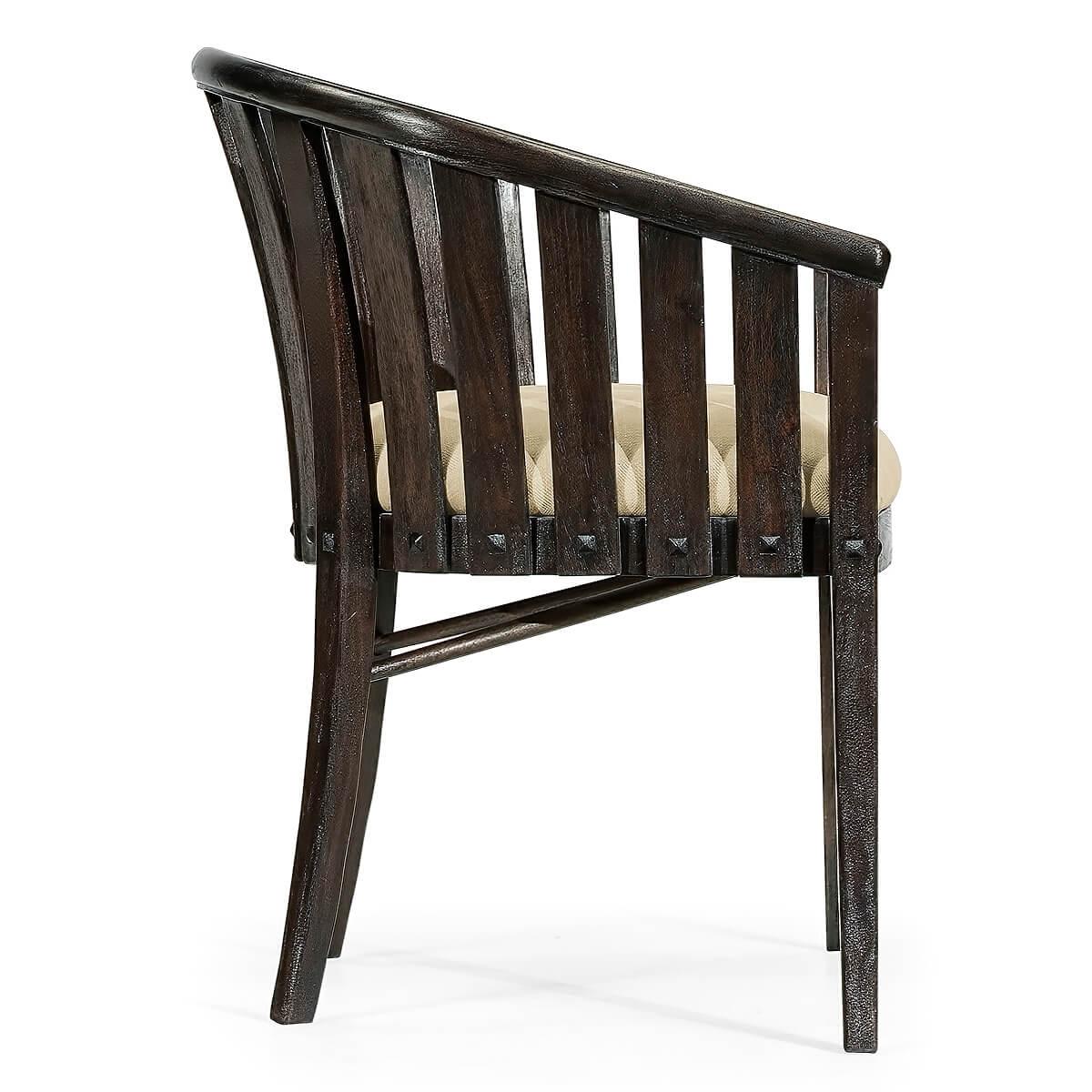 An Irish Country style barrel back tub chair with slatted backrest and cushioned seat above out flaring legs and finished in our Dark Ale (pub) color.

Dimensions: 27.25