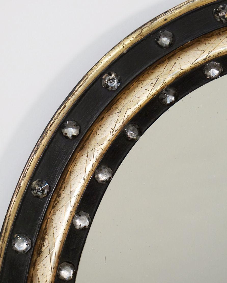 19th Century Irish Ebony and Gilt Oval Mirror with Faceted Glass Studs (H 22 1/4 x W 18 1/4)