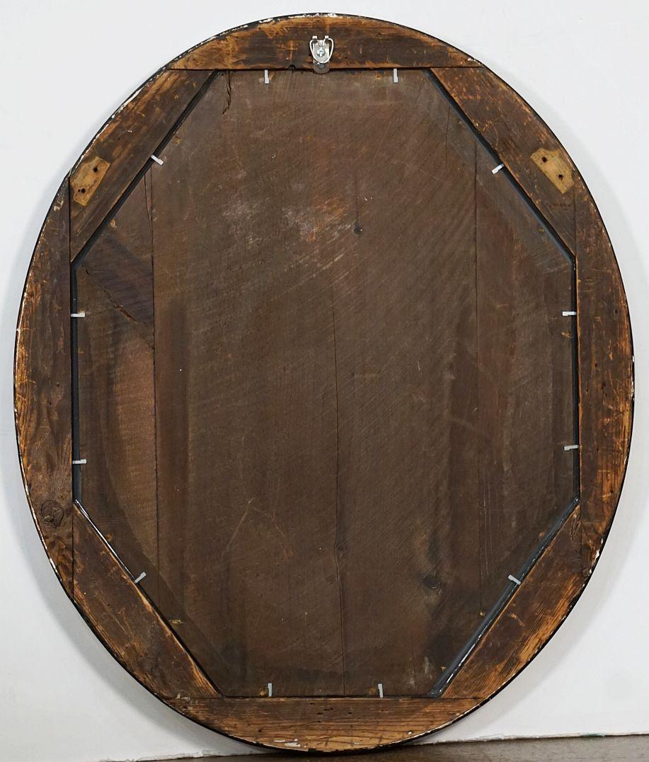 Ovaler Spiegel aus irischem Ebenholz und vergoldet mit facettierten Glasnieten (H 24 3/8 x B 20 1/2)  im Angebot 7