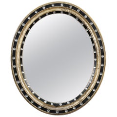 Irish Ebony and Gilt Oval Mirror with Faceted Glass Studs (H 24 3/8 x W 20 1/2)
