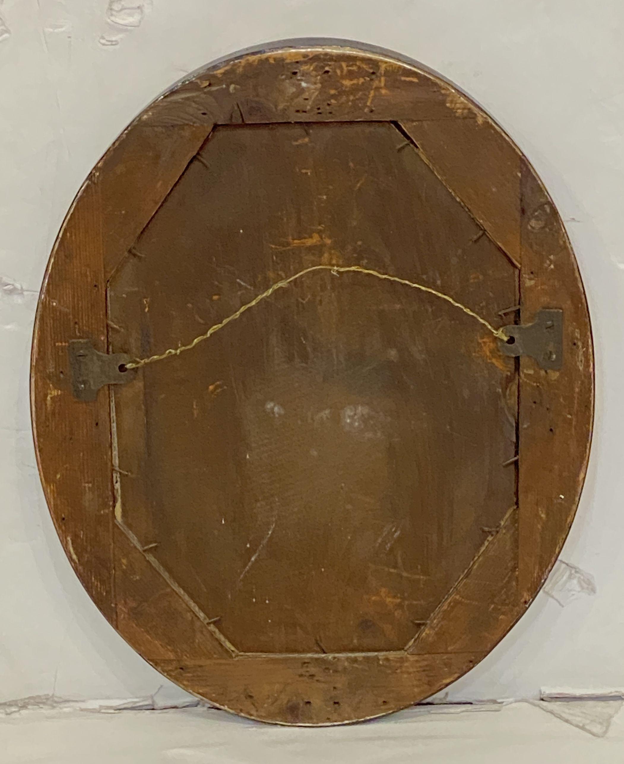 Specchio da parete ovale irlandese in ebano e dorato con borchie di vetro (H. 18 1/2 x L. 14 1/2) in vendita 2