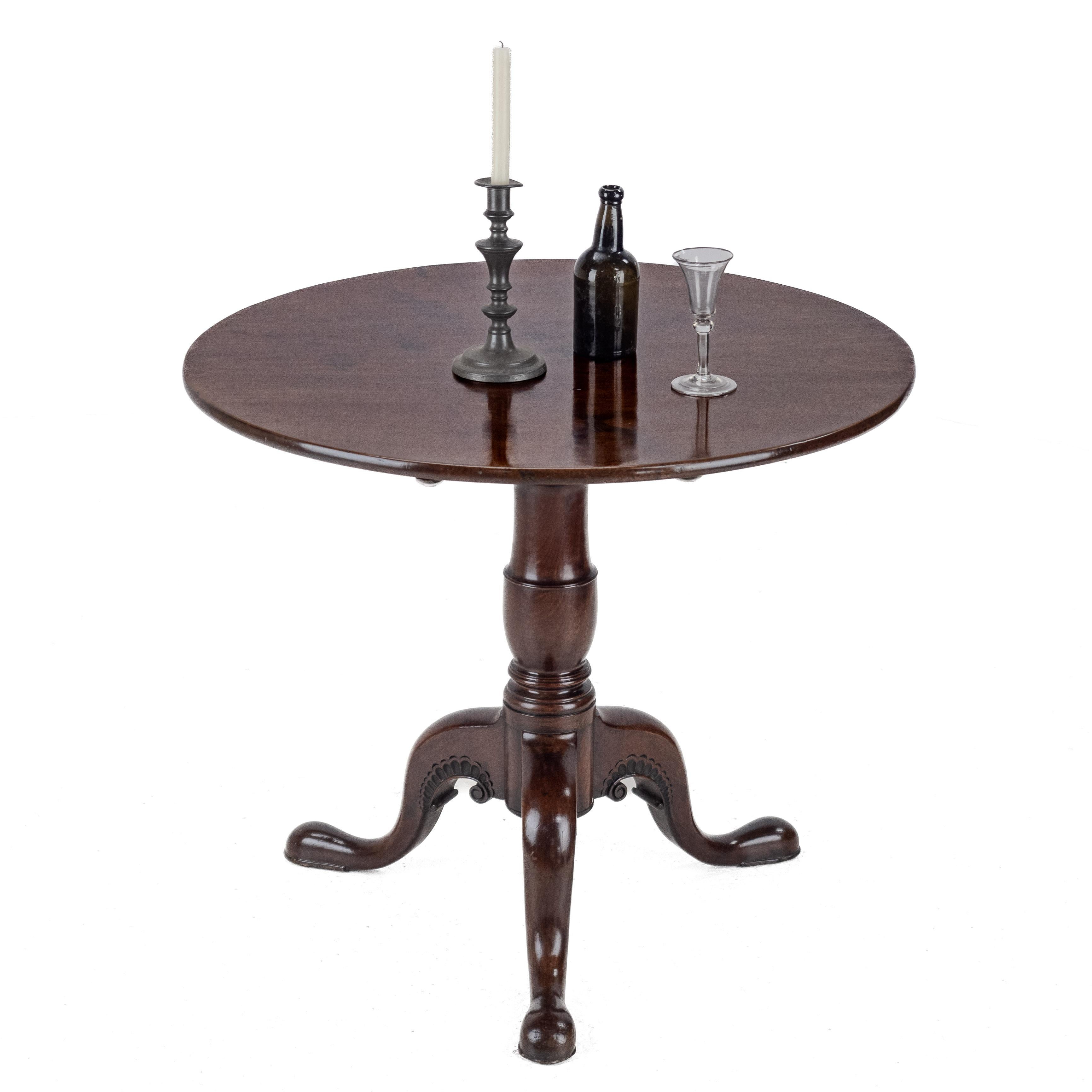 An Irish George II Period Carved Mahogany Tilt-Top Tripod Supper Table, circa 1750
A superb quality example, crafted from the finest early Cuban mahogany. The well-figured, single-piece solid top rests upon a well proportioned baluster stem, raised
