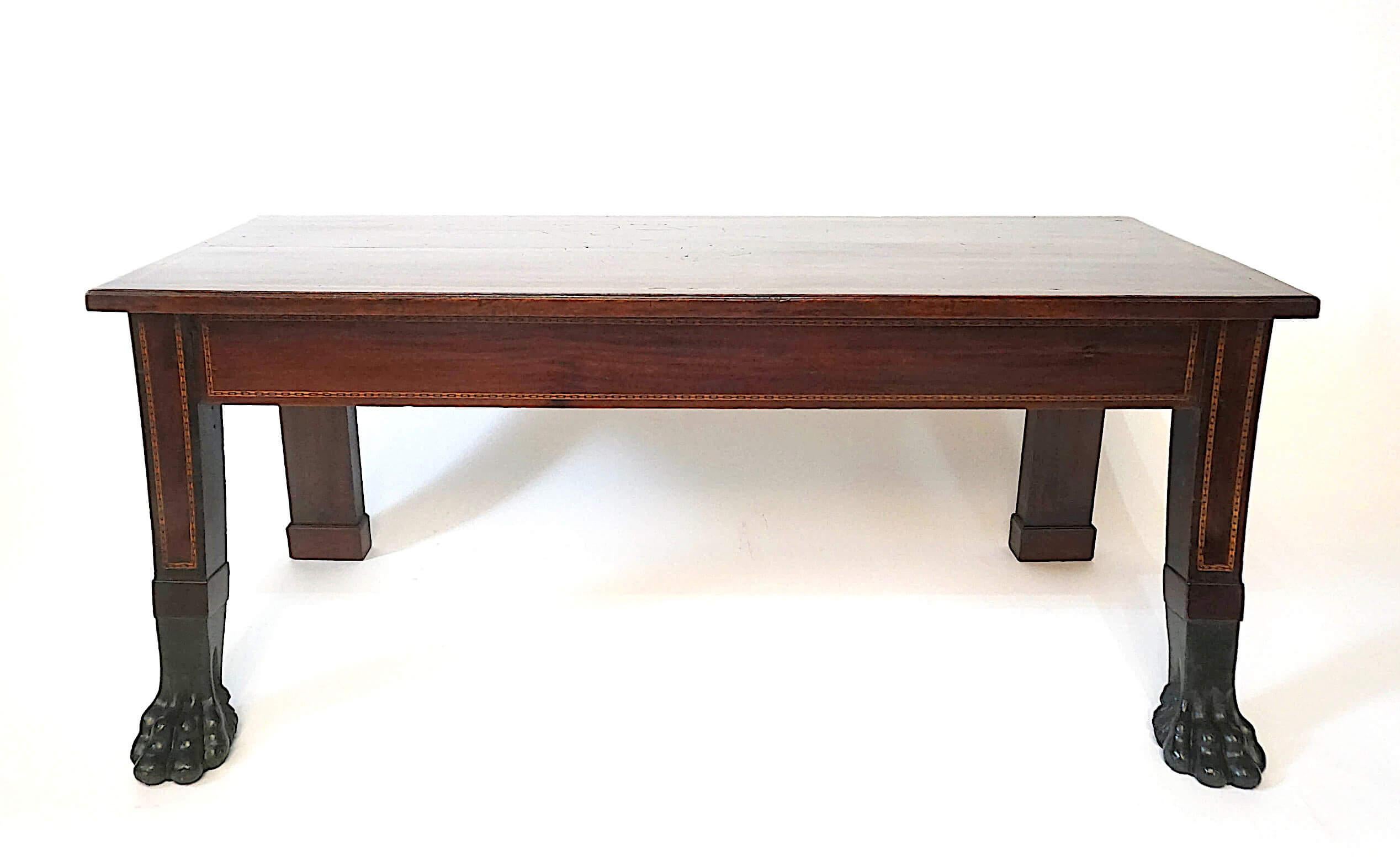 An exceptional circa 1805 Irish late George III neoclassical hall bench of solid mahogany construction, the rectangular seat with satinwood and ebony 'zigzag' border inlay above flat seat-rails with satinwood and ebony rectangular-chain border inlay