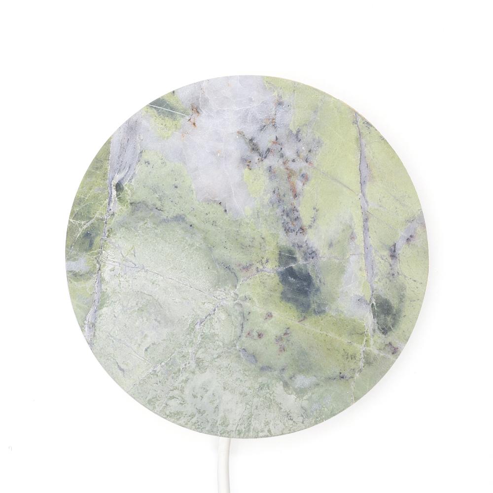 A marble base,
that quickly charges your phone, with a touch of magic.
 
A circle, 
a stone, 
realized with the care that marble requires.

A powerful wireless charging technology ensures an efficient and reliable power delivery.

The result is a