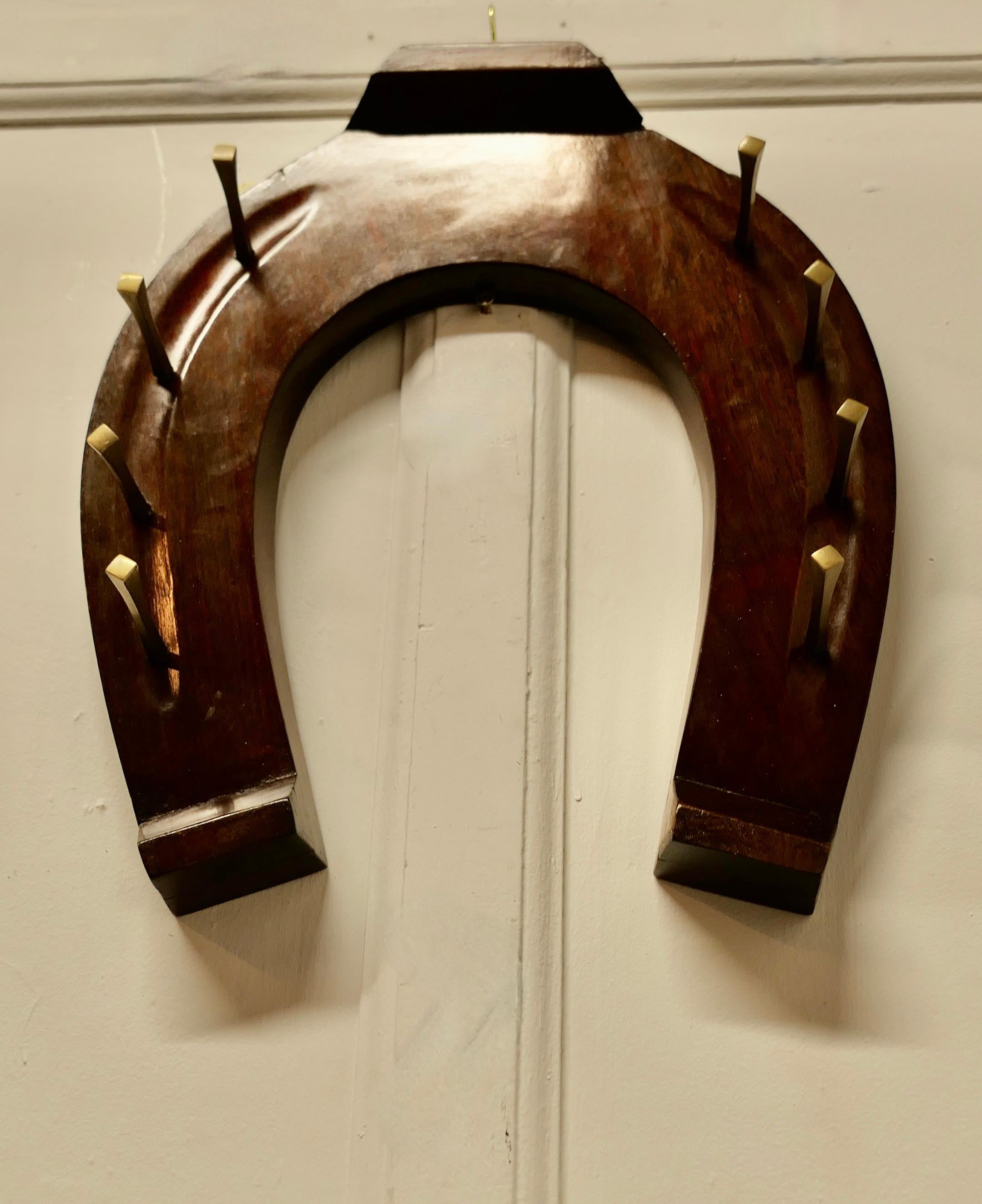Folk Art Irish Horseshoe Coat and Tack Rack by B McMullen  A fine quality piece   For Sale