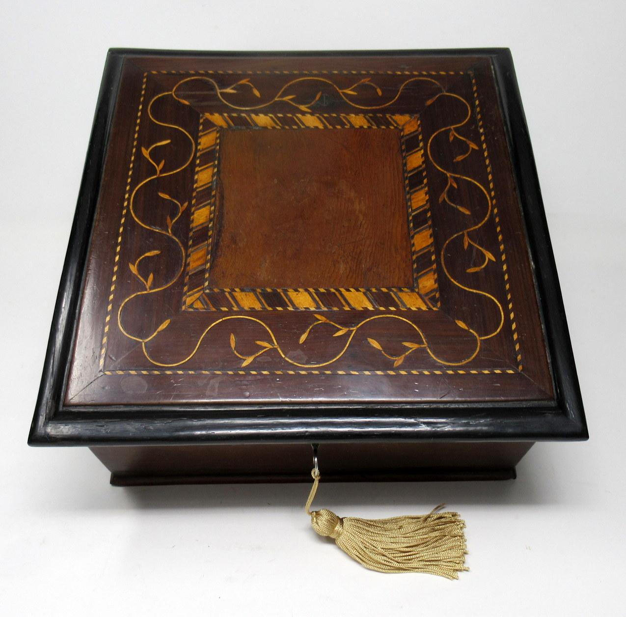 Superb Irish Killarney Ware Arbutus Ladies or Gentleman's jewelry casket or table box of outstanding quality. 

Mid-late 19th century. The square form thumb molded hinged cover with a central rectangular vacant reserve with barber pole inlaid