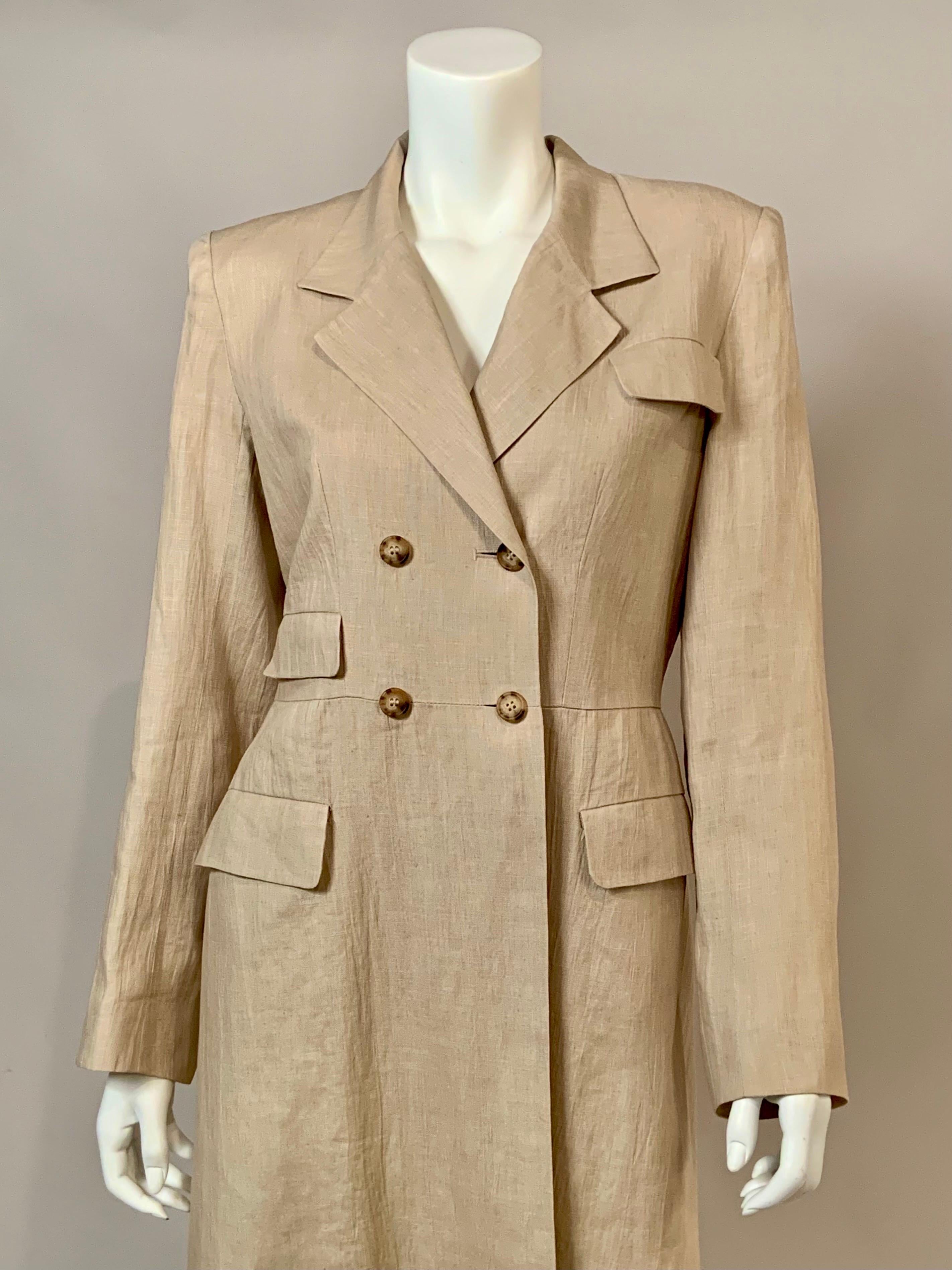 This Irish made Irish Linen duster coat by Willis & Geiger is so beautifully tailored.  It has a notched lapel, a left side breast pocket, a right side waist pocket and two pockets on the hip.  There are four horn buttons on the front of the duster