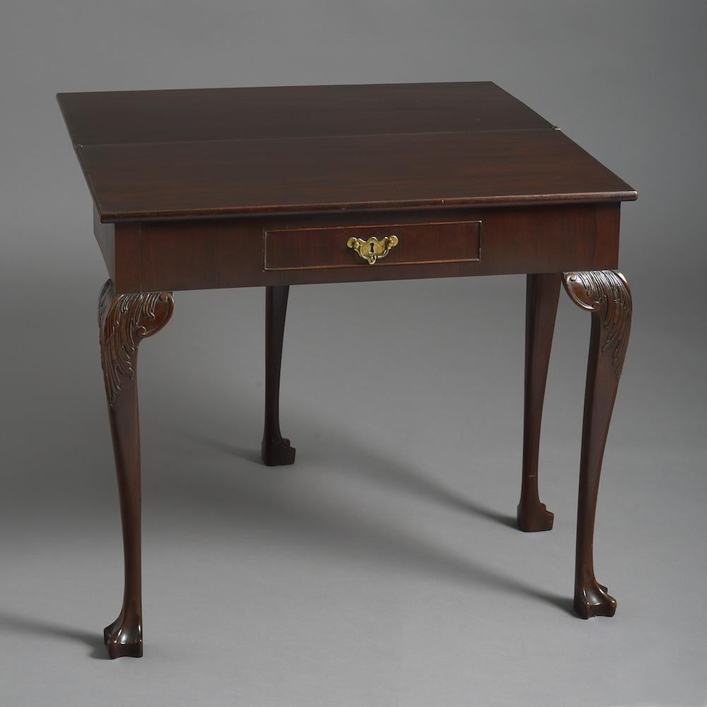 A Irish George II mahogany tea table, circa 1760.
