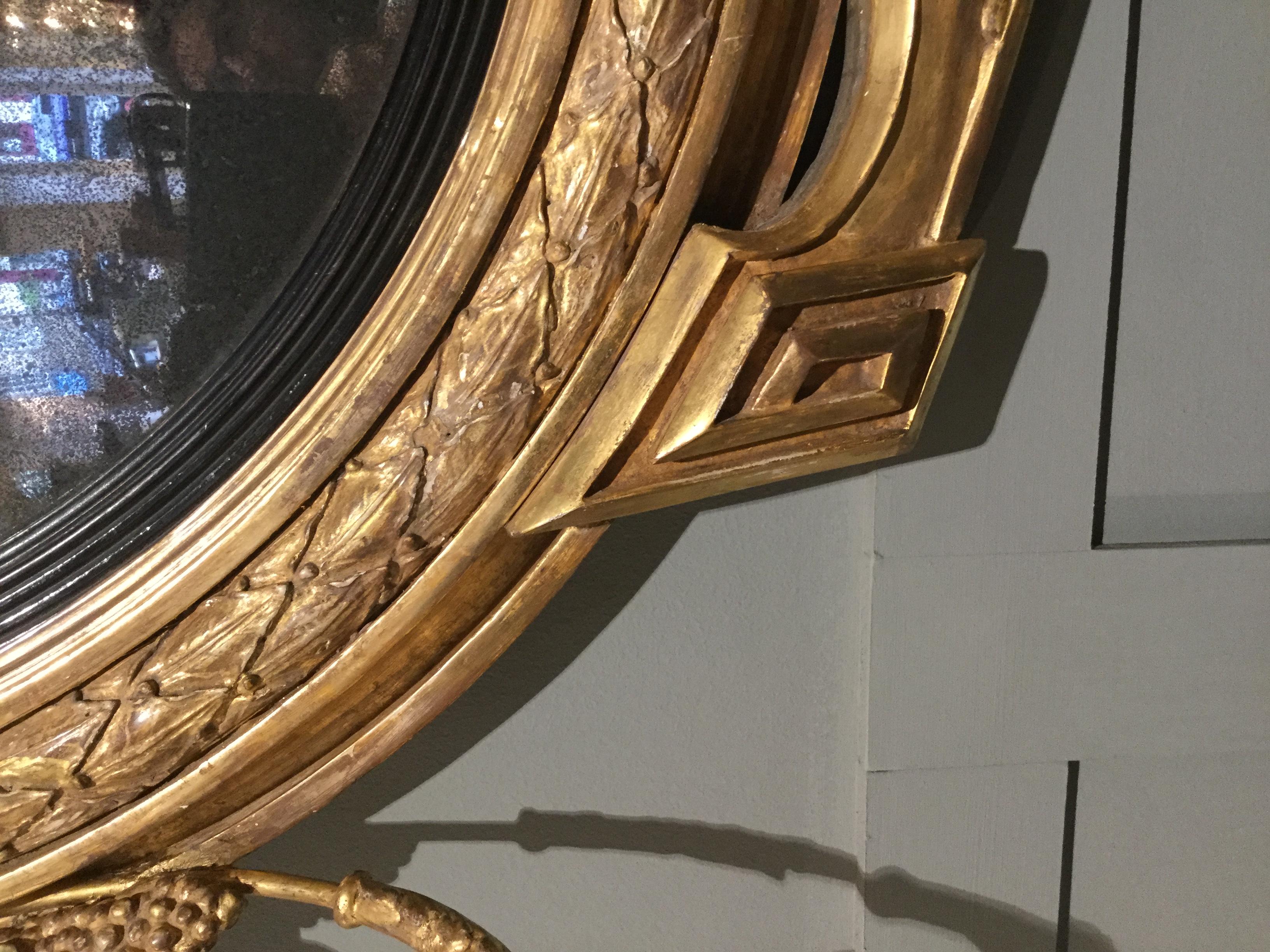 Irish Period Regency Gilt Carved Girandole Convex Mirror In Good Condition For Sale In Bradford on Avon, GB