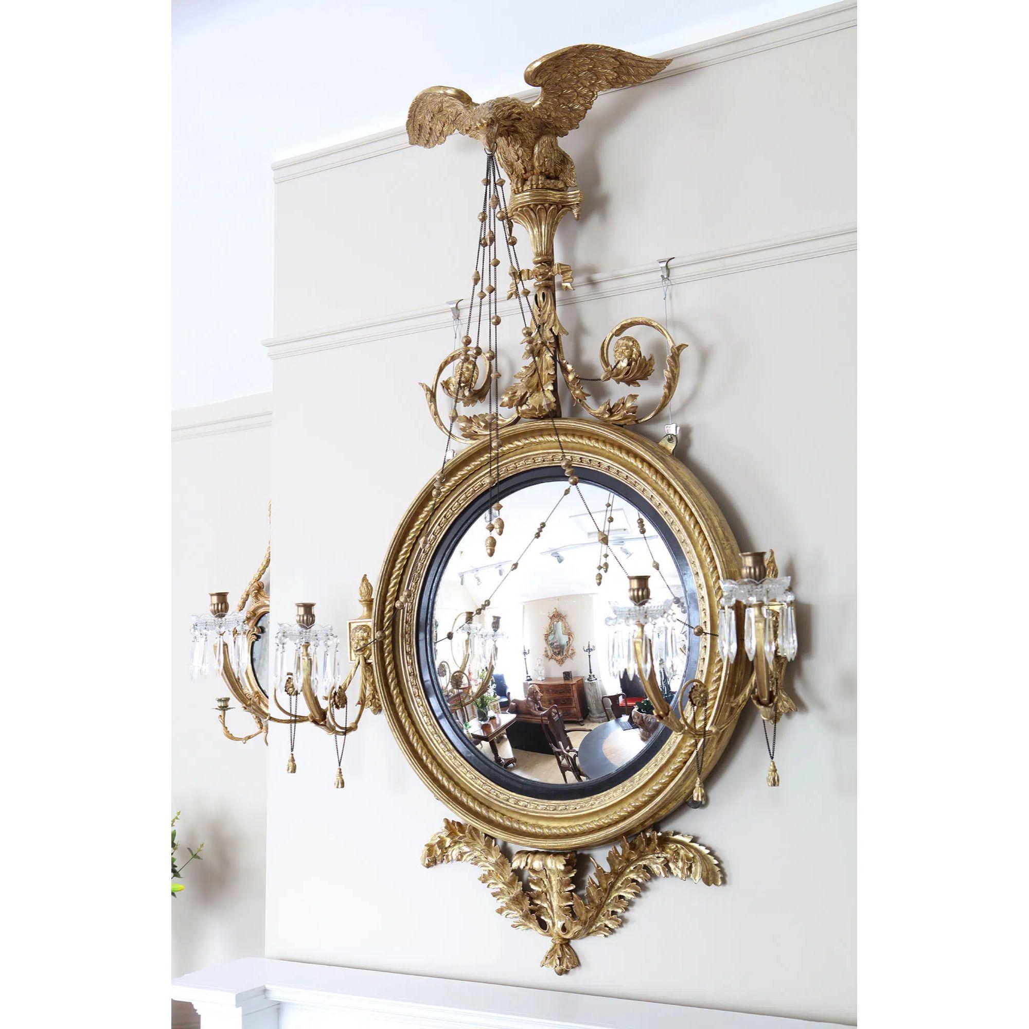 An Irish Regency giltwood and ebonised four-light girandole, signed and dated verso Arthur Williams

Irish Convex Mirror
Signed and dated verso Arthur Williams, July 10th, 1815
Williams is a craftsman known to have worked for Richard Jackson of