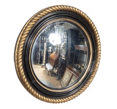 Miroir convexe en bois doré et ébonisé Irish Regency