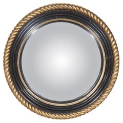Miroir convexe en bois doré et ébonisé Irish Regency