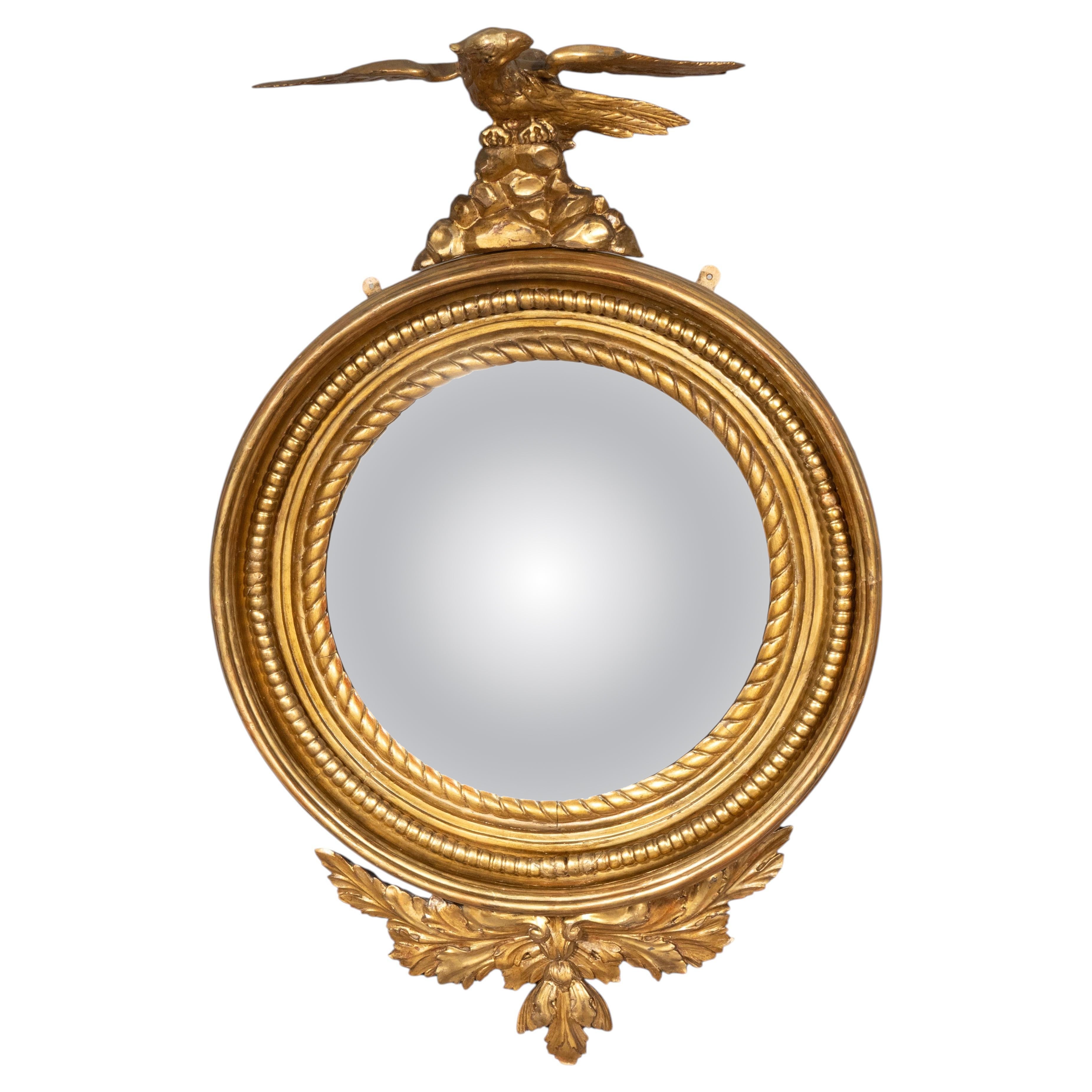 Specchio convesso in legno dorato dello stile Regency irlandese in vendita