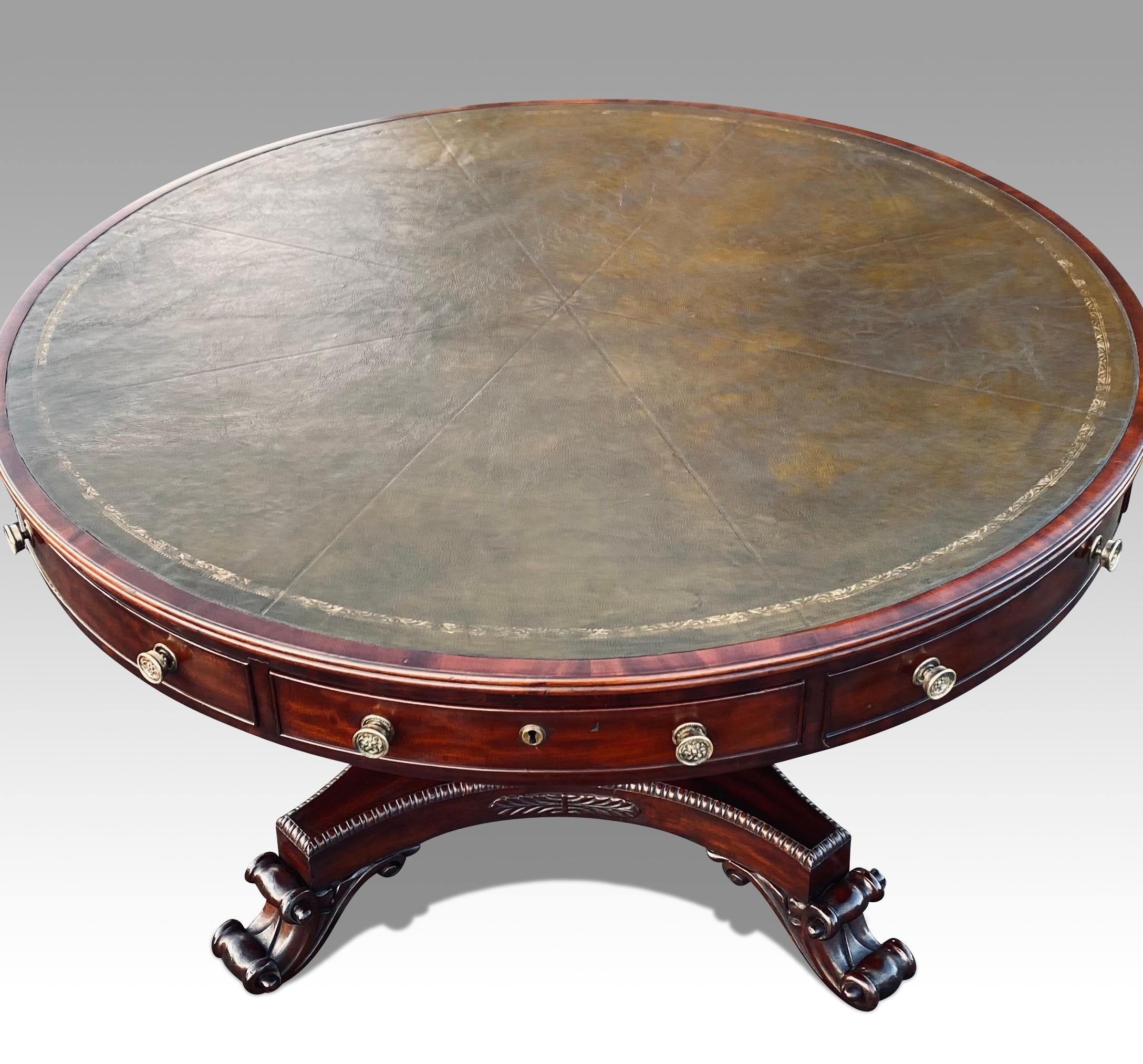 A superb Irish Regency period mahogany drum table in the manner of Williams & Gibton- Dublin.
The leather lined circular top within a crossbanded border with an arrangement of 2 long & 2 short drawers with opposing dummy drawer fronts.
The drawers