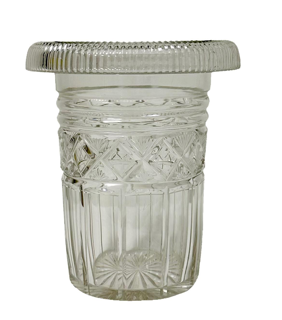 A very early 19th century Irish regency crystal vase for flowers or could be for a wine bottle. It is just beautiful with a starburst on the bottom.