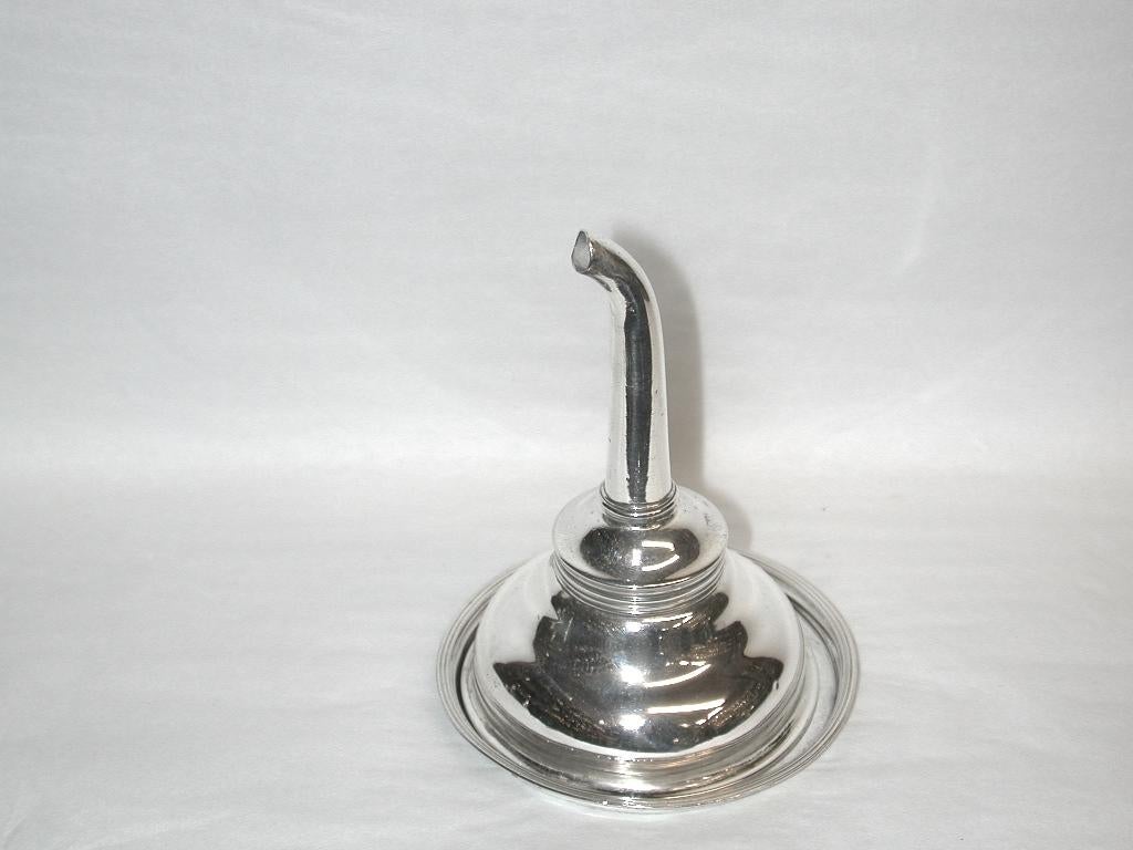 Irish silver Georgian wine punnel and stand, 1801, William Bond, Dublin.
Delightful wine strainer and matching stand, same date and maker.
Typical triple thread edge on both pieces.
The strainer works well with a circular piece of muslin fitted