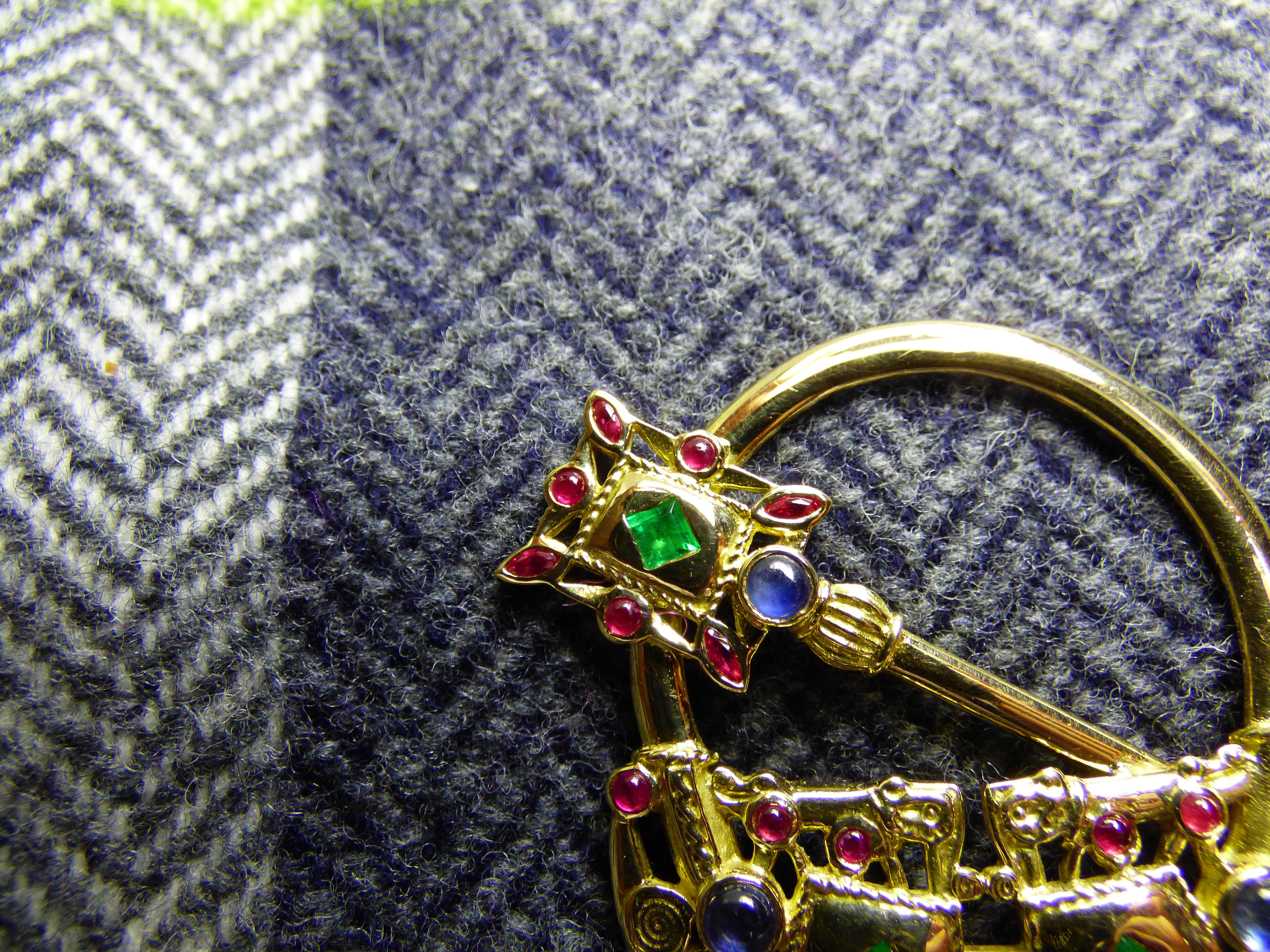 Modern Irish Tara Brooch in 18K yellow Gold set with Emeralds, Rubies, and Sapphires For Sale