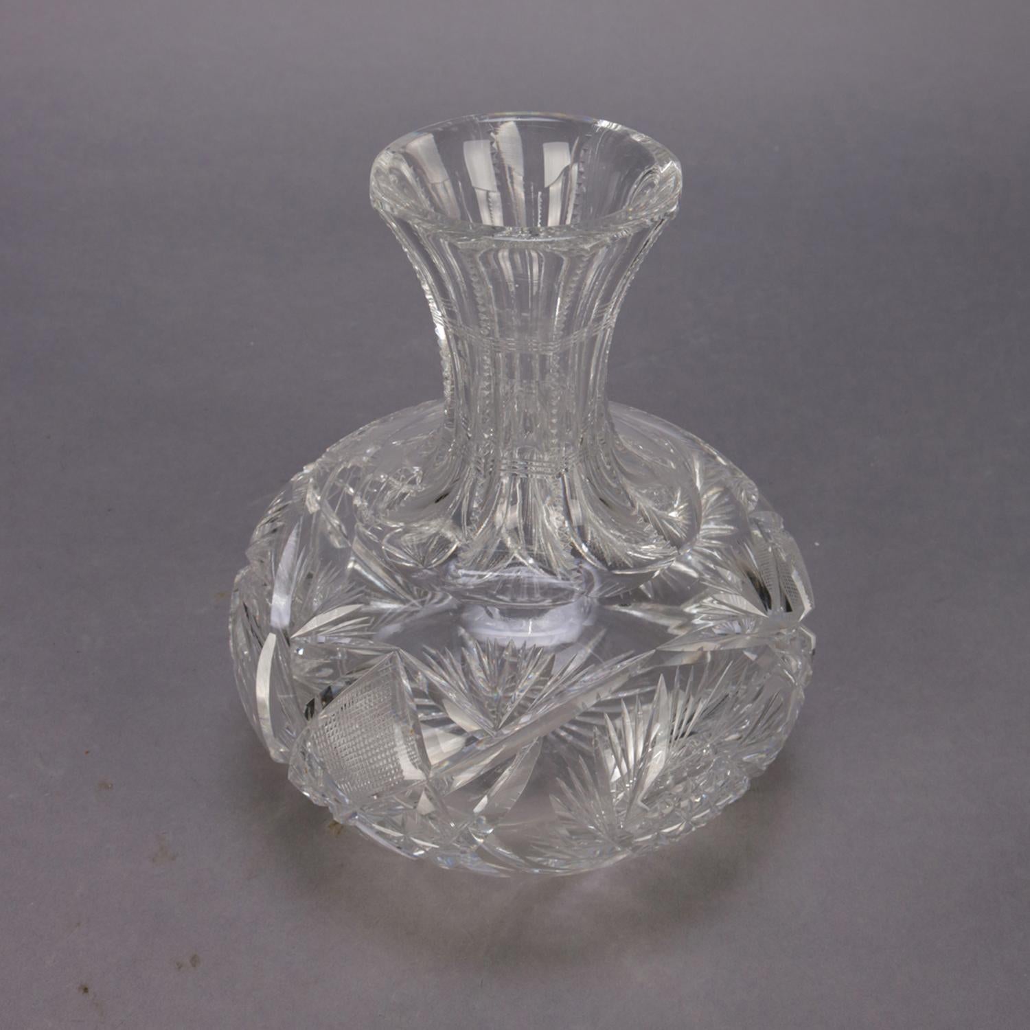 A Hawkes School American Brilliant Cut Glass wine carafe features squat cut crystal ball with ribbed neck terminating in flared mouth, 20th century.

Measures: 7.25